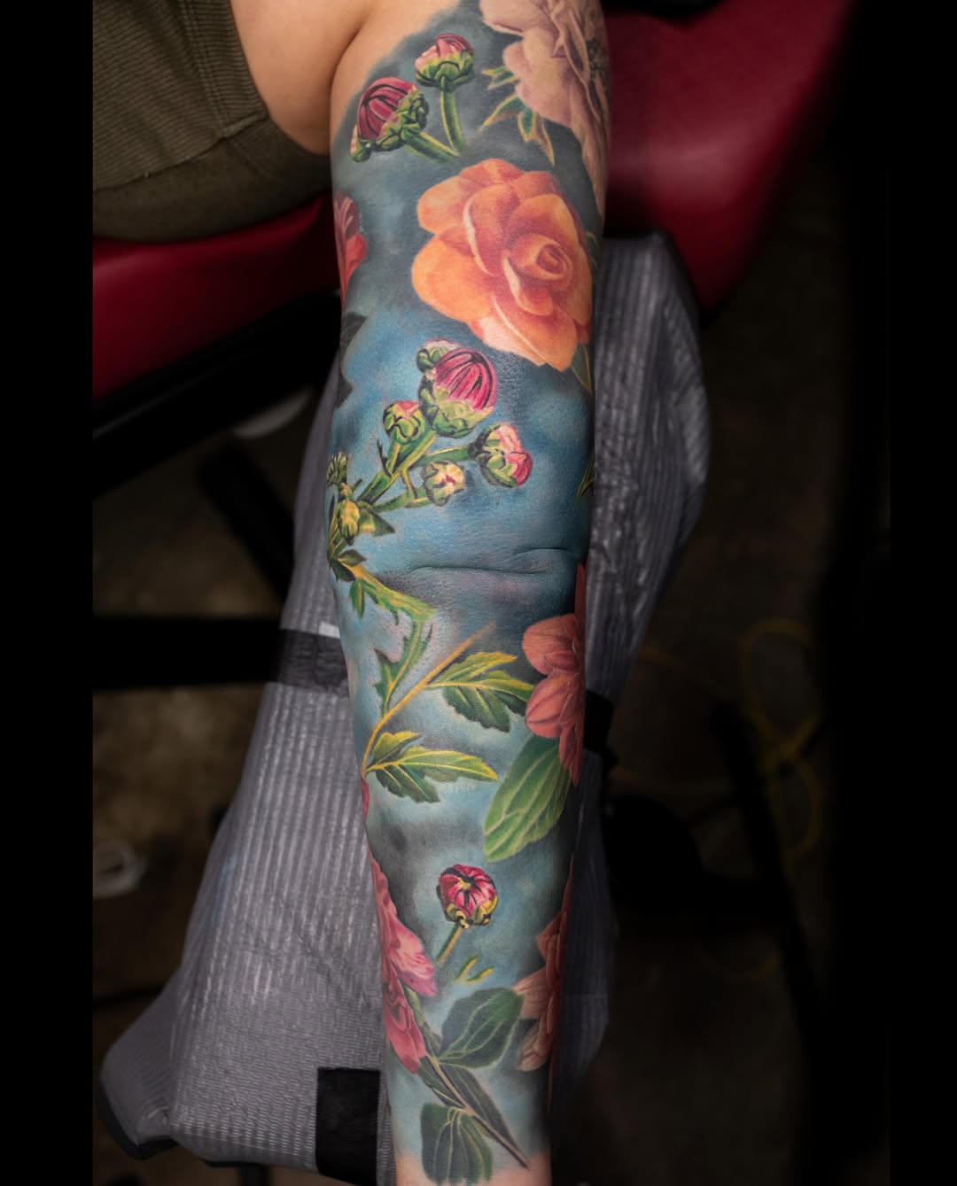 Floral sleeve neo-traditional tattoo on the forearm by Realistic tattoos in Minneapolis, MN, Minneapolis, Minnesota