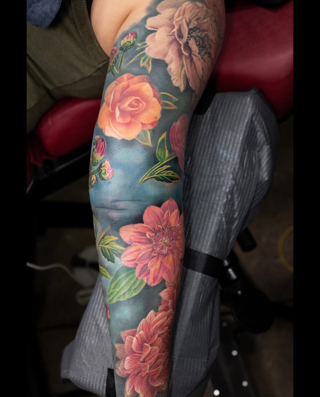Floral sleeve neo-traditional tattoo on the forearm by Realistic tattoos in Minneapolis, MN, Minneapolis, Minnesota