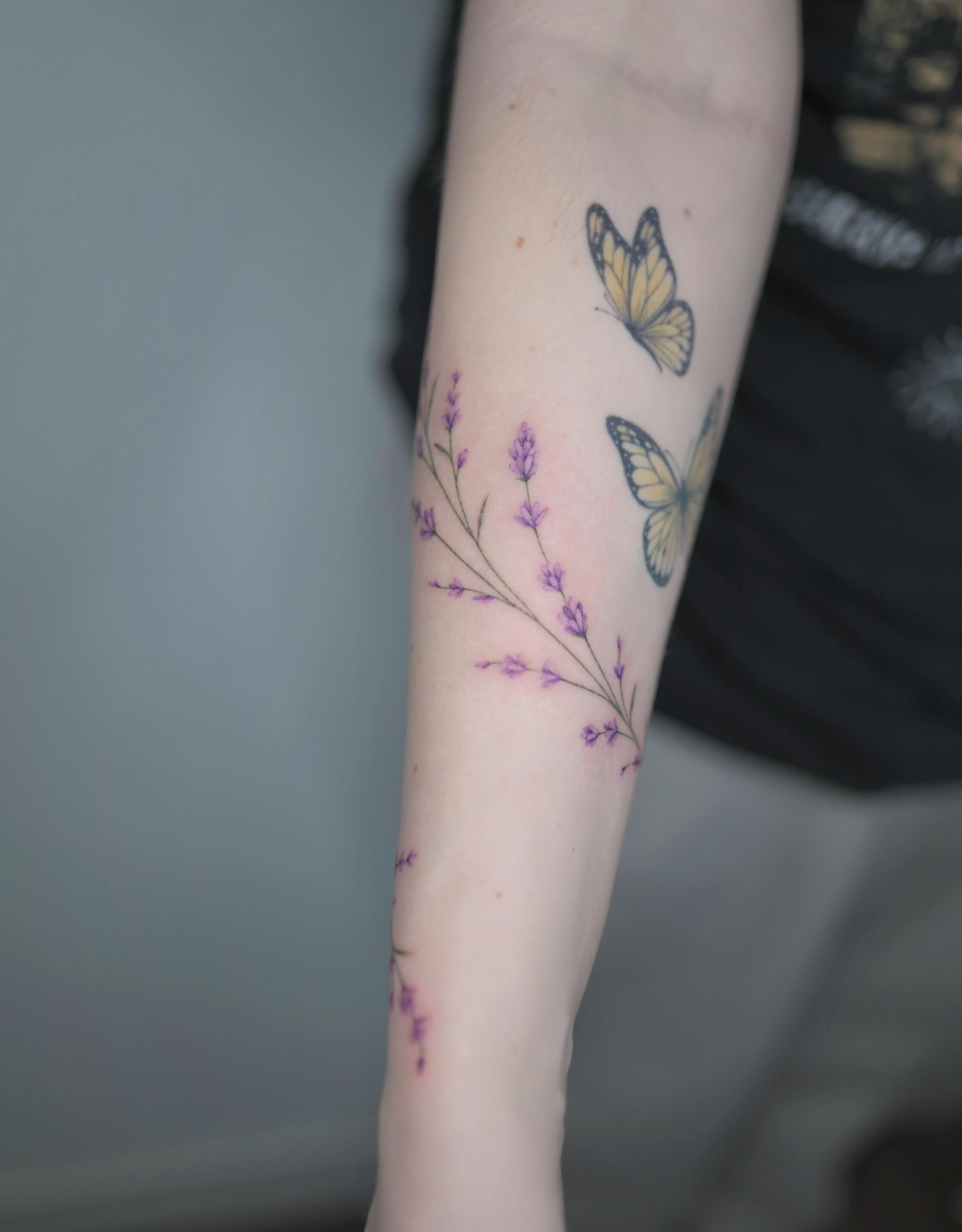 Butterflies and lavender dotwork tattoo on the forearm by Seattle tattoo artist-Mia