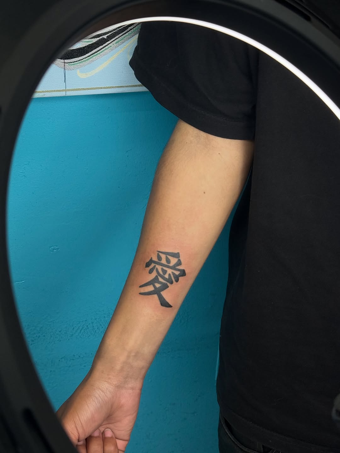 Japanese character for love tattoo on the forearm by ⠀Greave