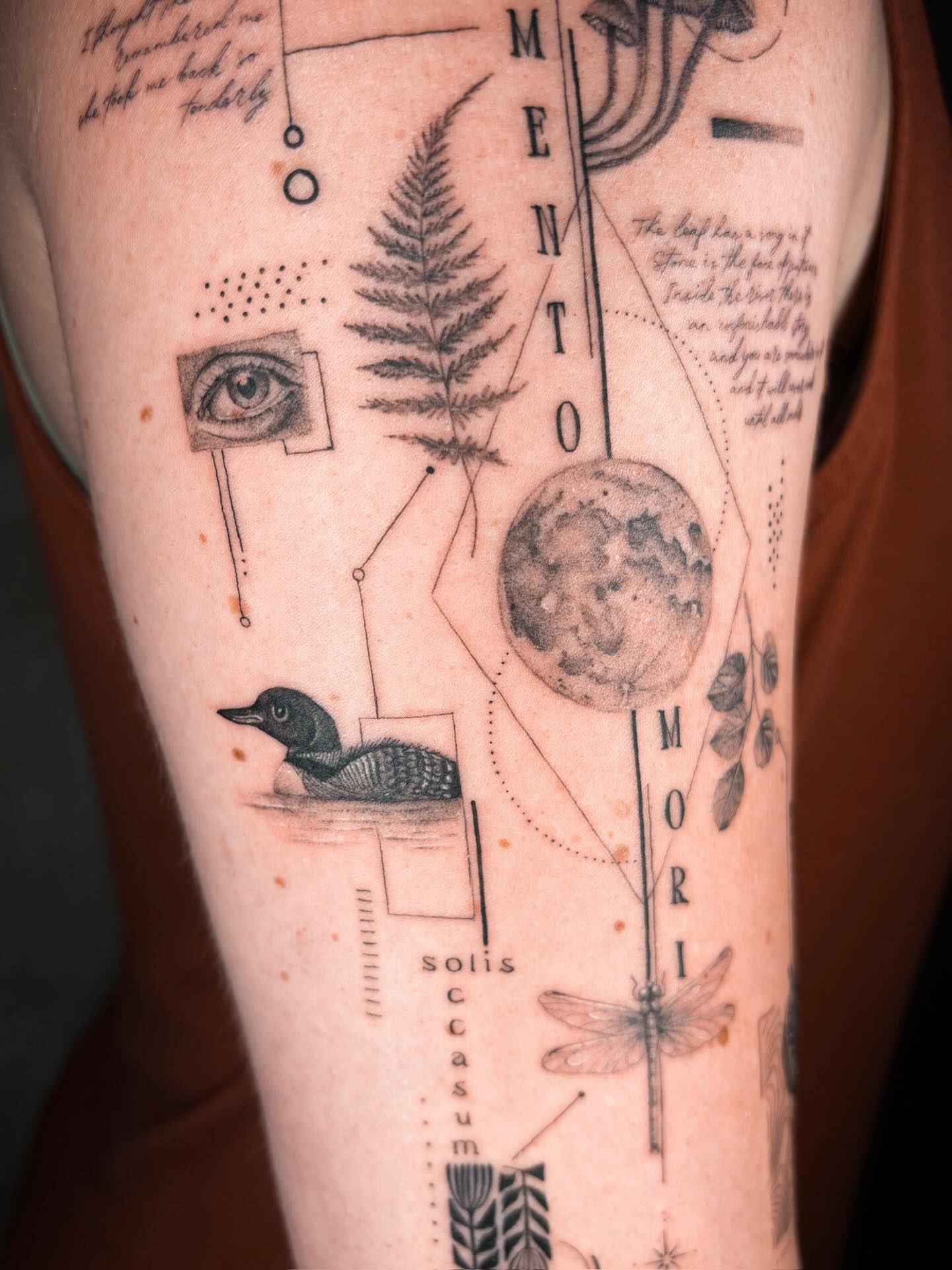 Loon and moon black and grey tattoo on the forearm by Annie