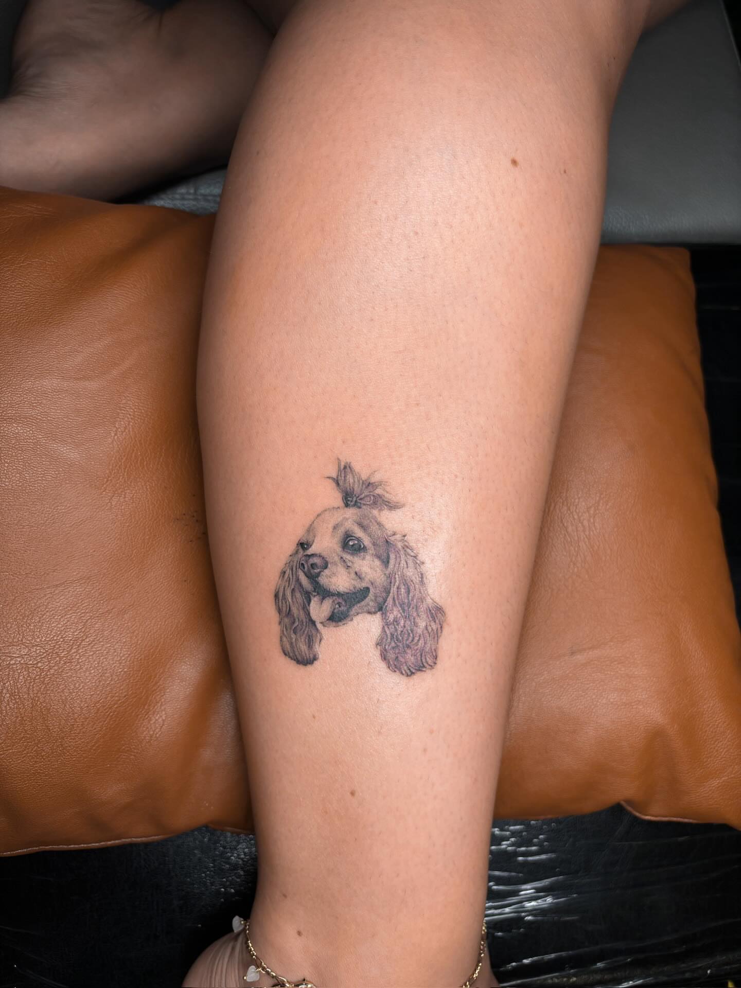 Dog realism tattoo on the forearm by Annie