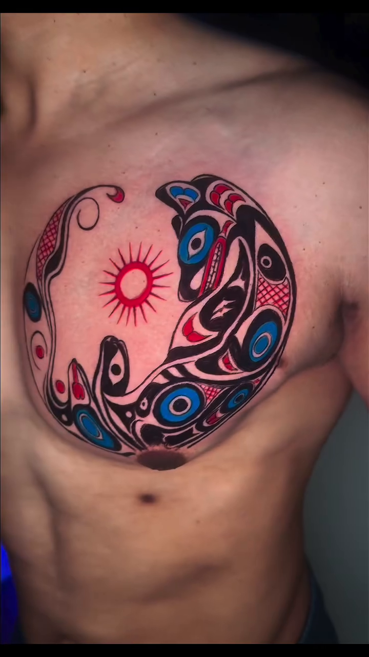 Tribal tattoo on the chest by InkedByJide Tattoo, Atlanta, Georgia