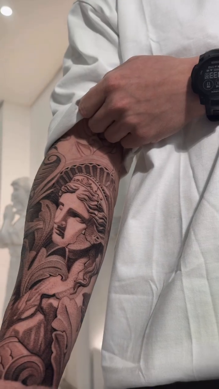 Greek goddess with laurel leaves realism tattoo by Viktor Govorukhin