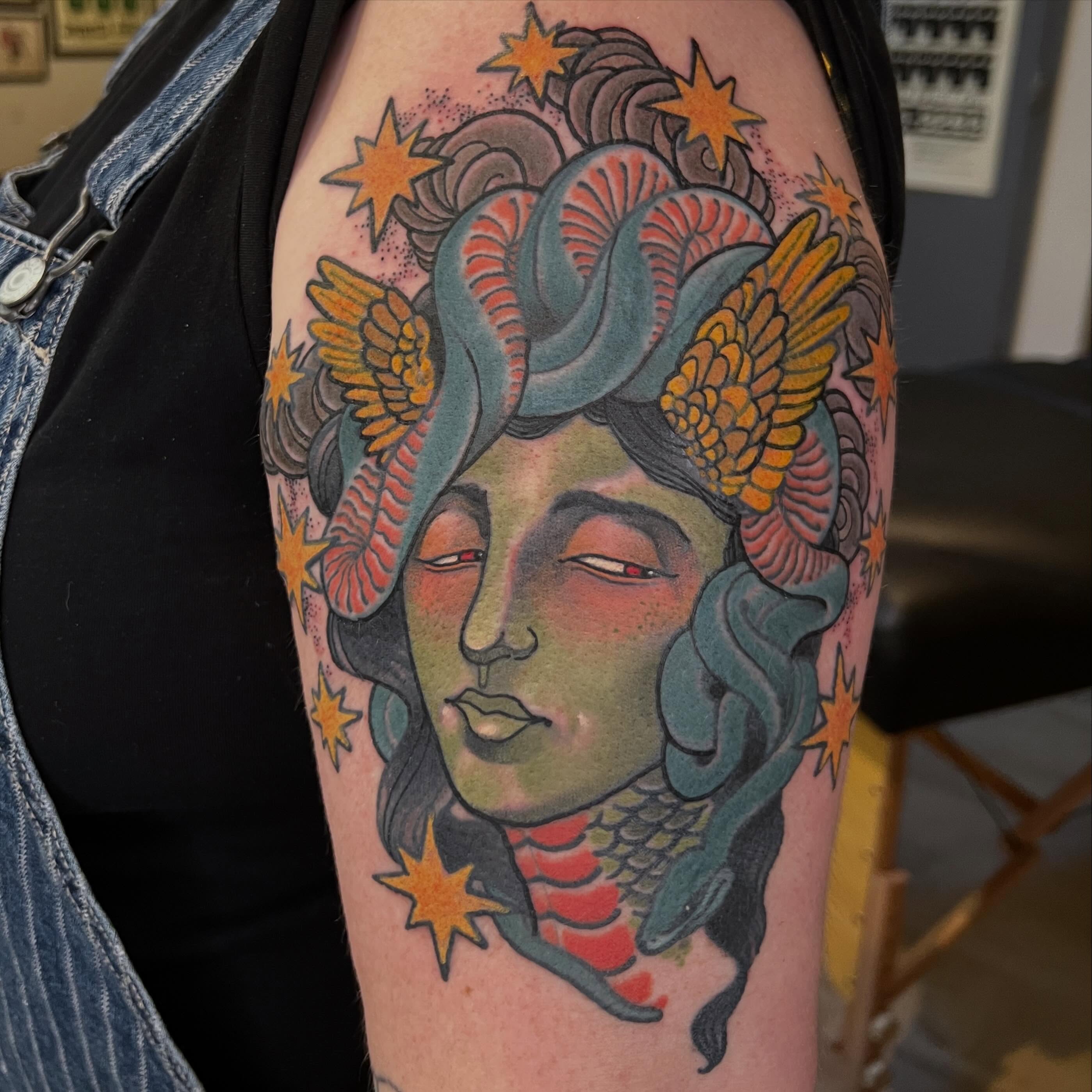 Medusa with snakes and stars neo-traditional tattoo on the forearm by Troy David Souders