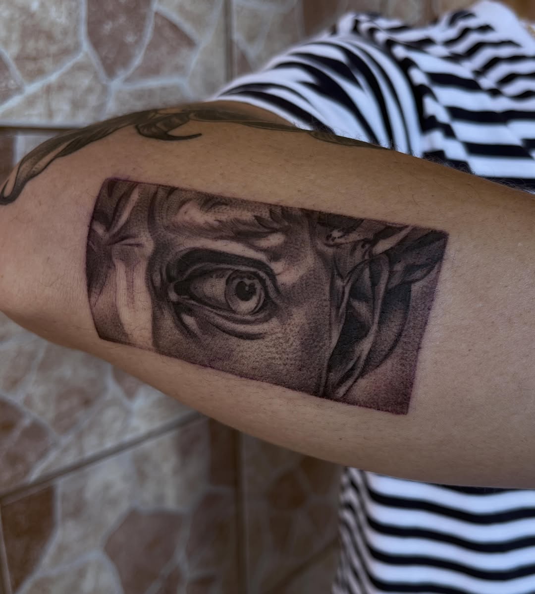 Tattoo by @cv__tattoo — realism, black_and_grey