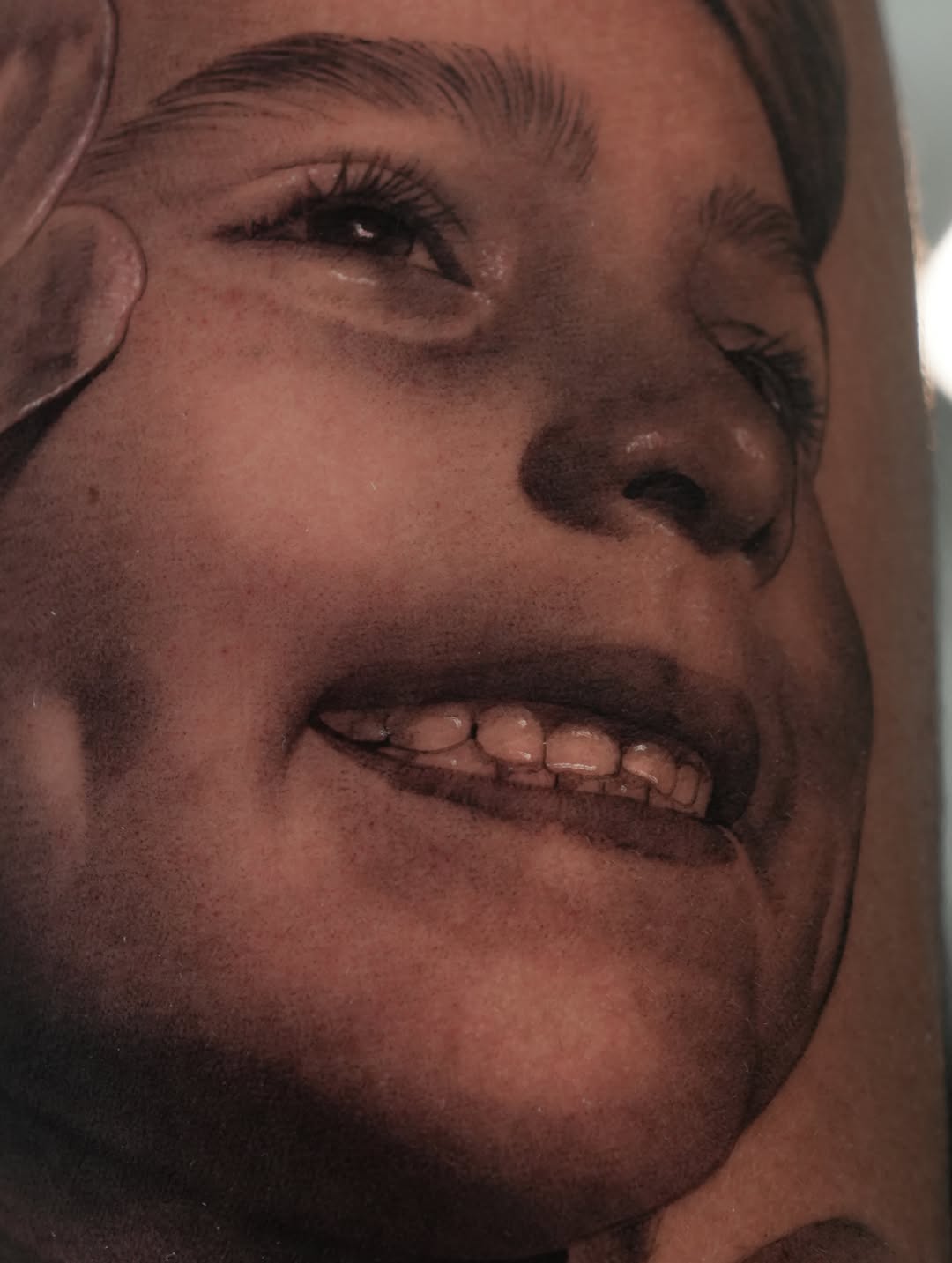 Portrait of a child realism tattoo by J O S S I e L P I N e D A