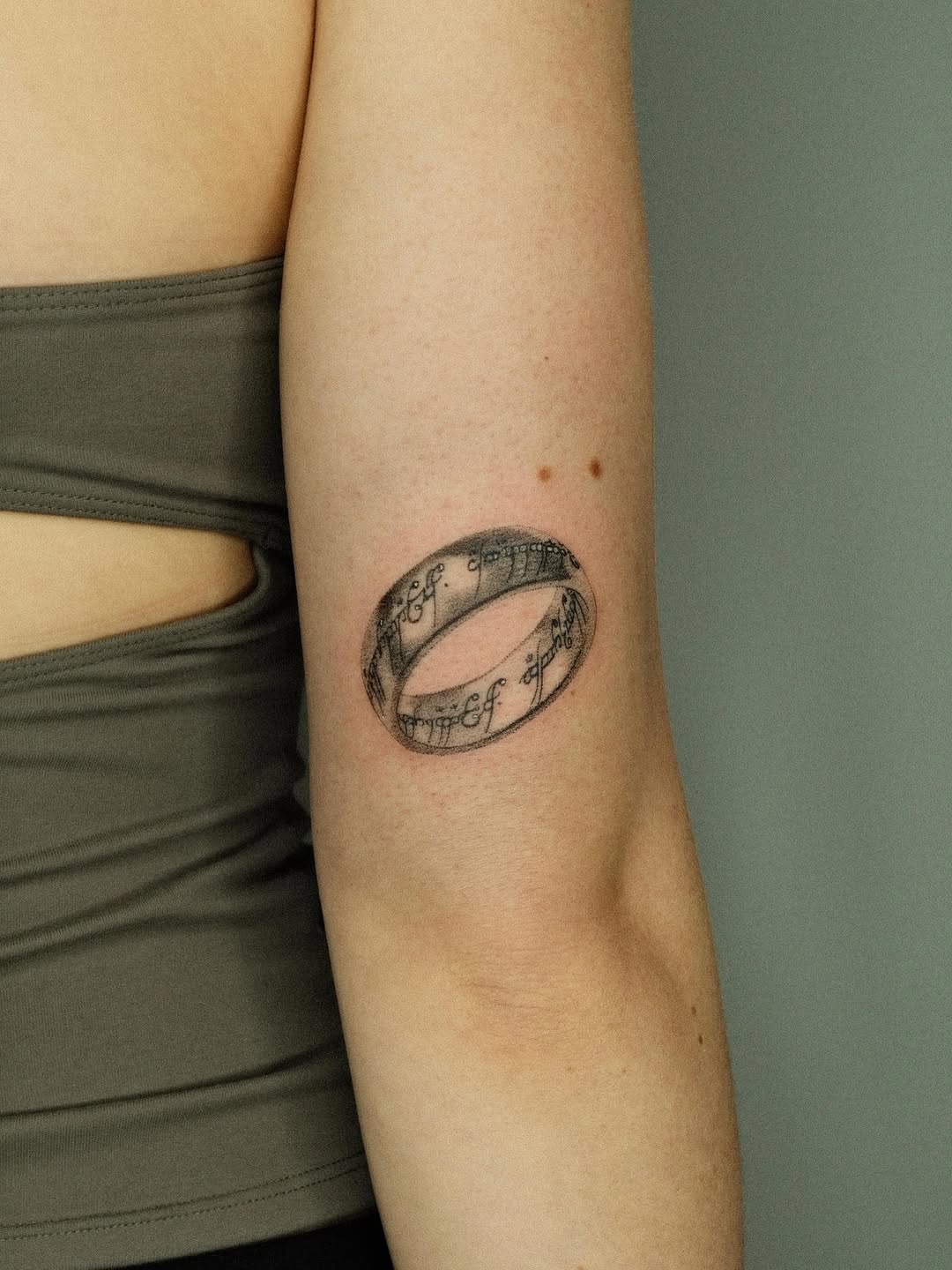 The One Ring inscription lettering tattoo on the forearm by Thiên Hồ