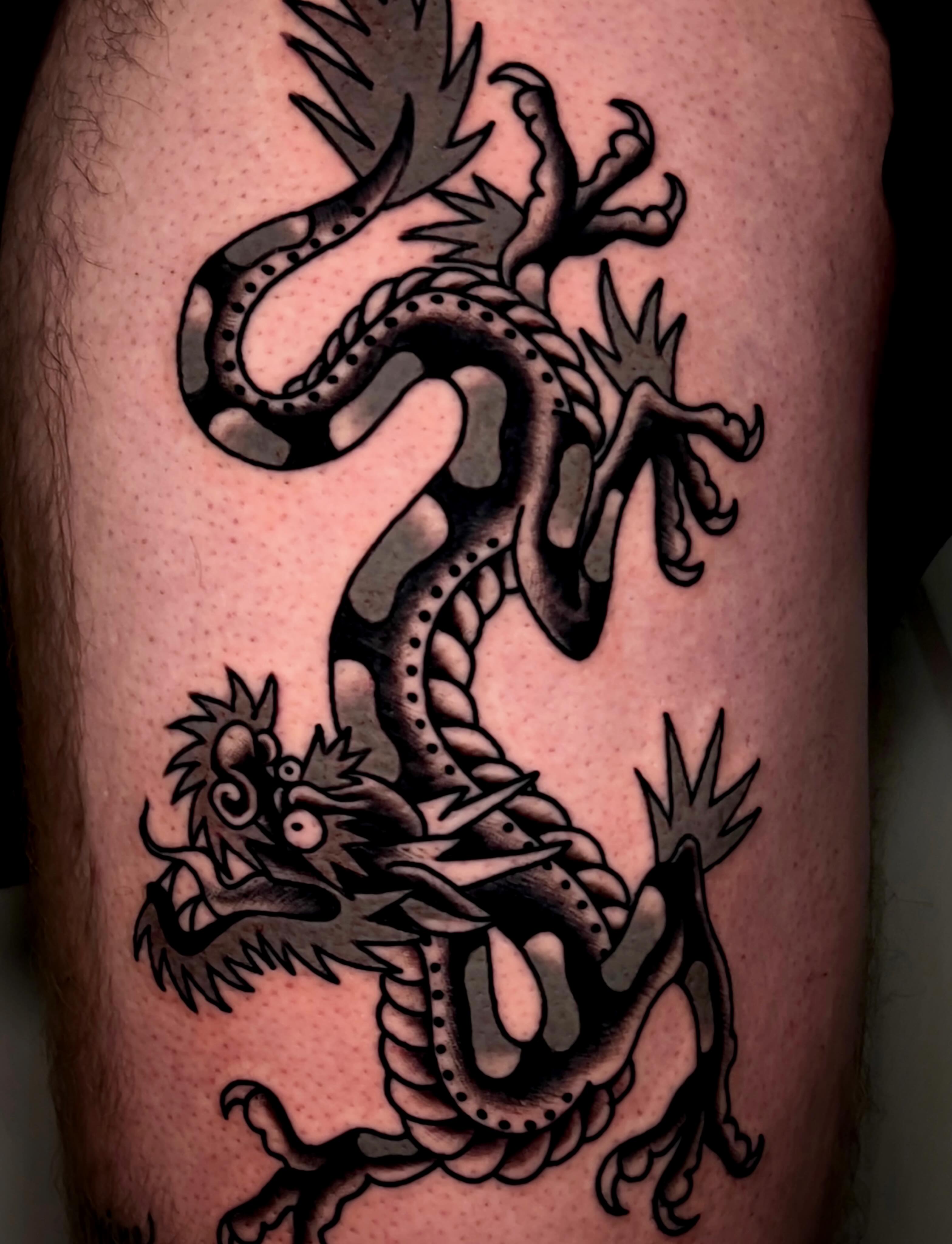 Dragon black and grey tattoo on the thigh by ReadyFreddie_tattoo