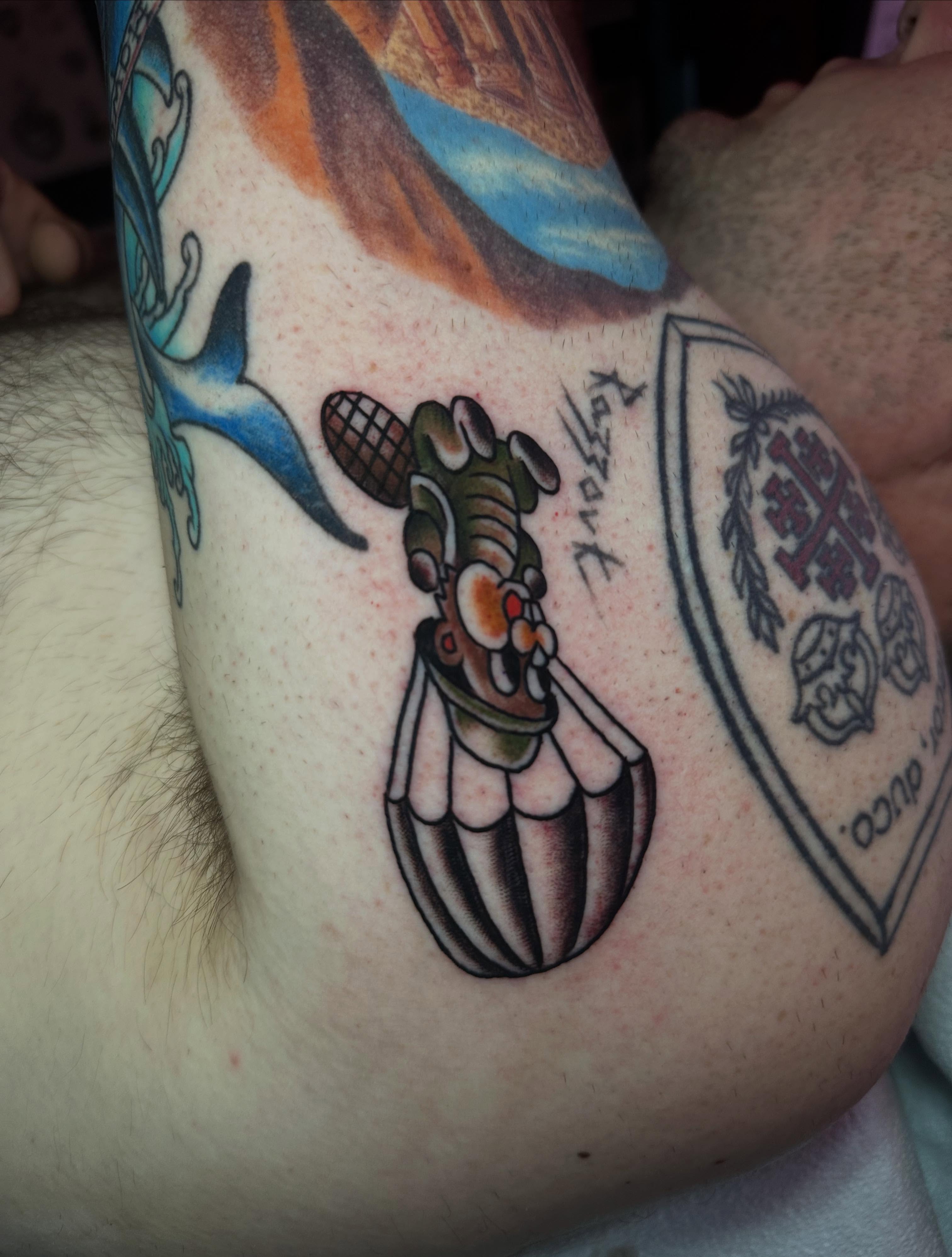 Lobster American traditional tattoo on the forearm by Chris Bishop
