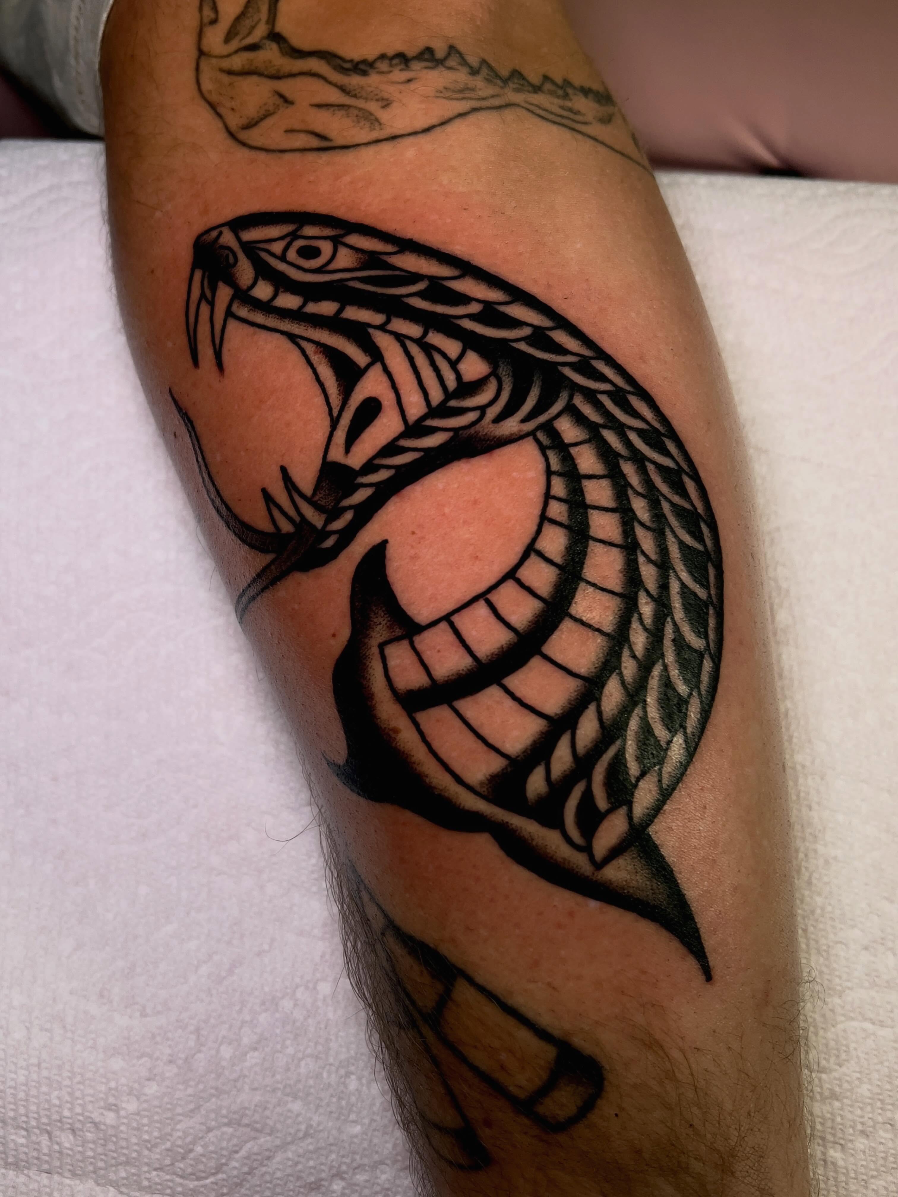 Snake black and grey tattoo on the forearm by ReadyFreddie_tattoo