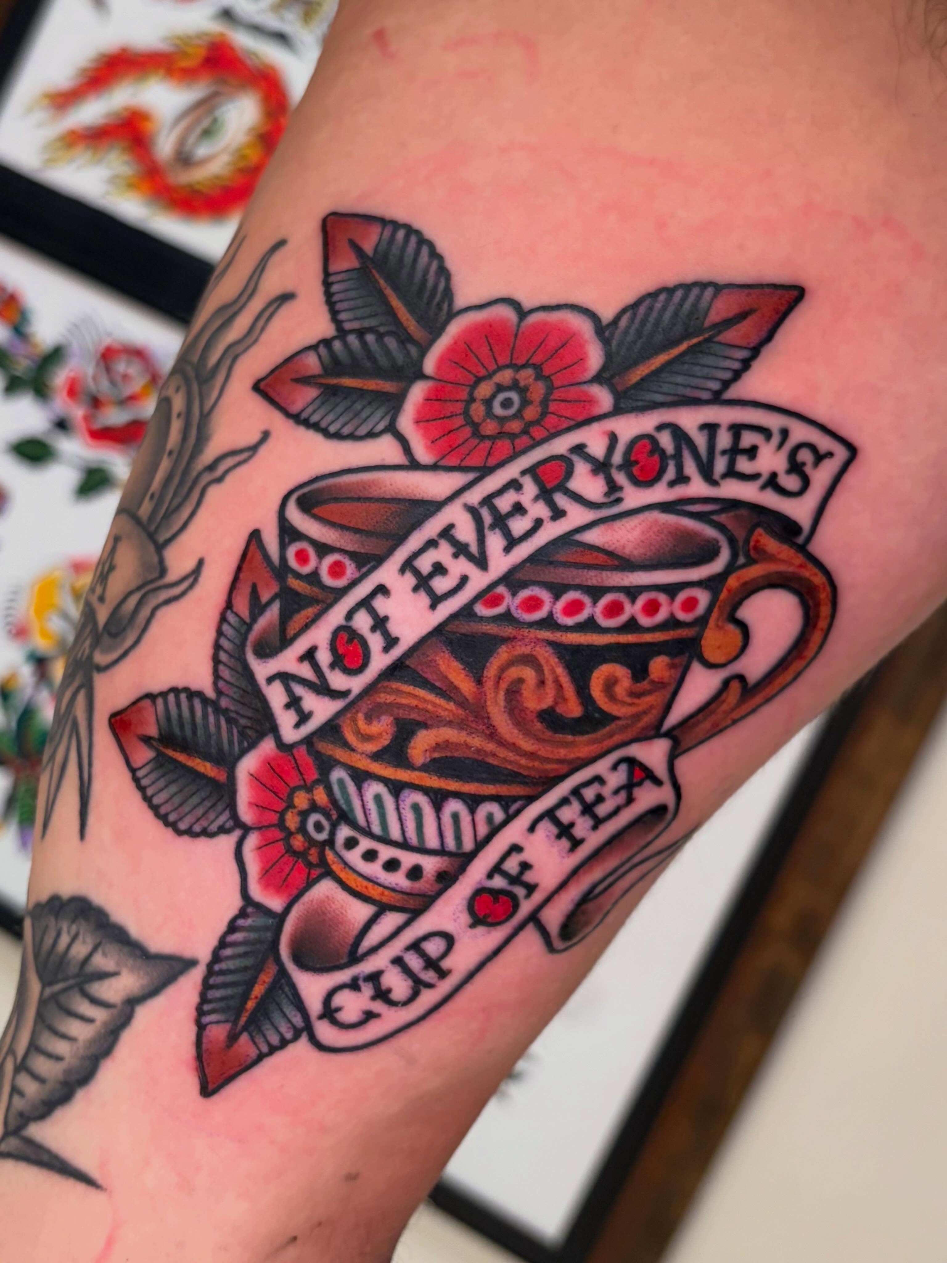 Cup of tea American traditional tattoo on the forearm by ๐ป๐๐๐ ๐ณ๐๐๐๐๐๐ ๐๐๐