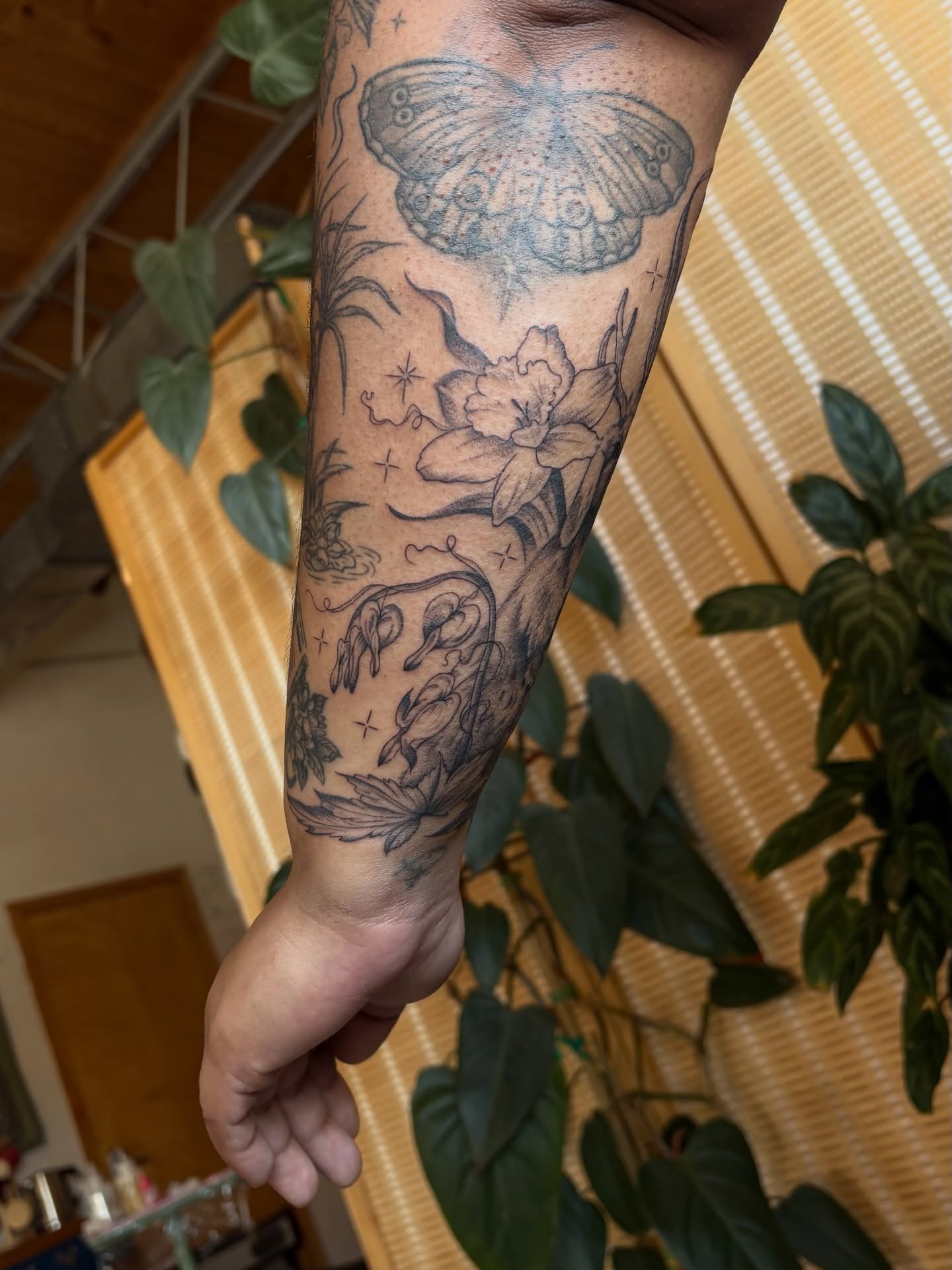 Butterfly and flowers black and grey tattoo on the forearm by emery ♡ slc utah tattoo artist