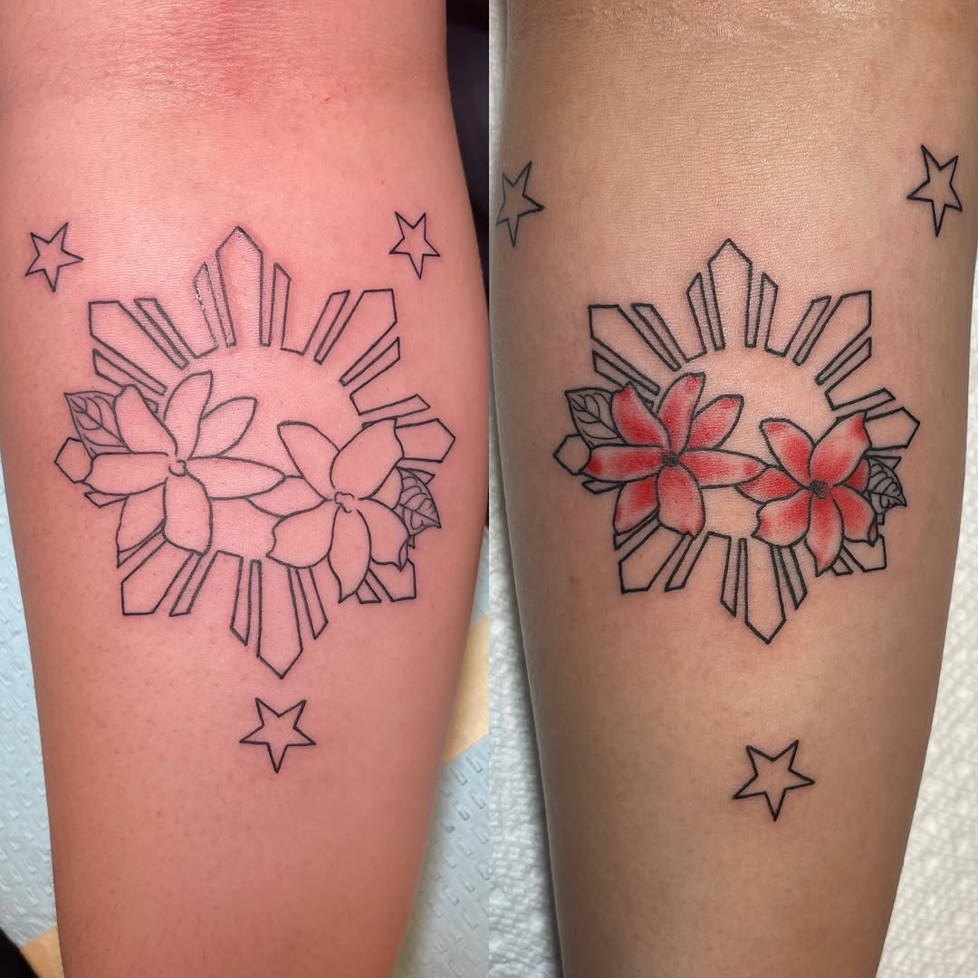 Philippine sun with flowers and stars geometric tattoo on the forearm by Ashley Antolin