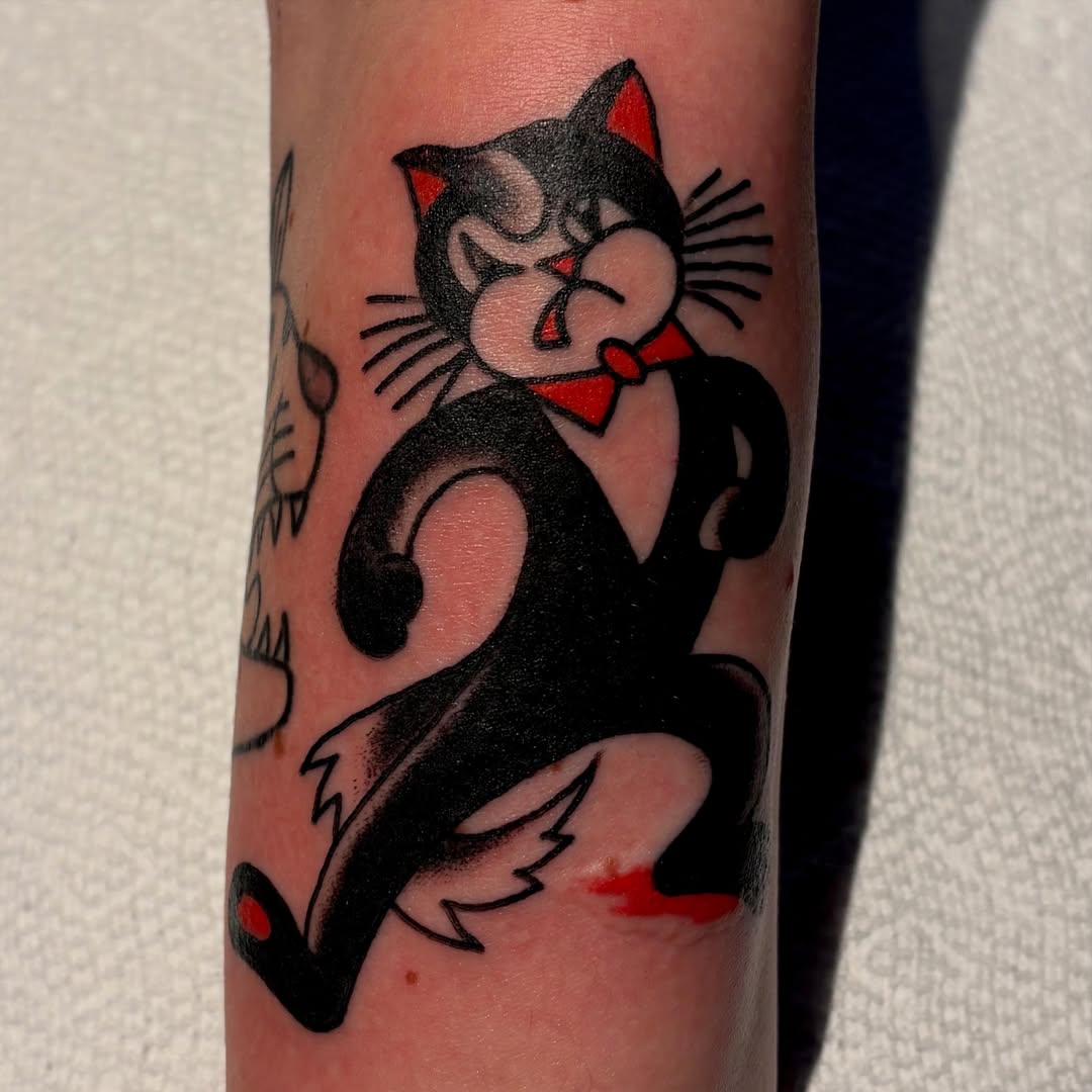 Cat American traditional tattoo on the forearm by Shane Coslett
