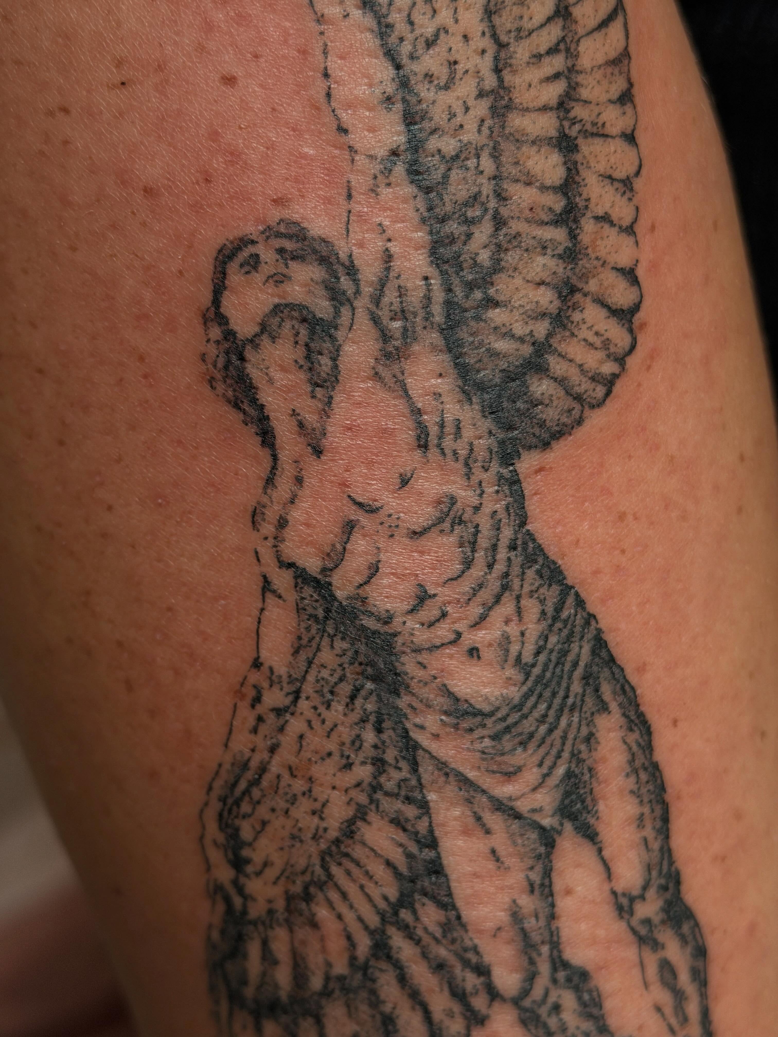 Angel black and grey tattoo on the upper arm by Babymaxy Inks Llc