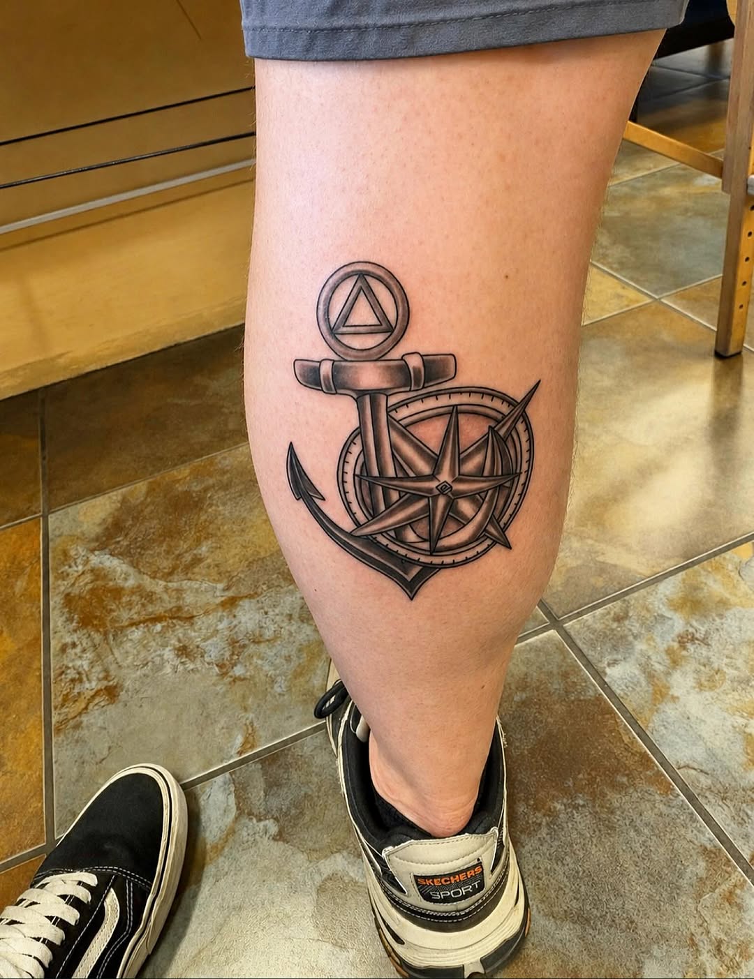 Anchor and compass American traditional tattoo on the calf by Stoney