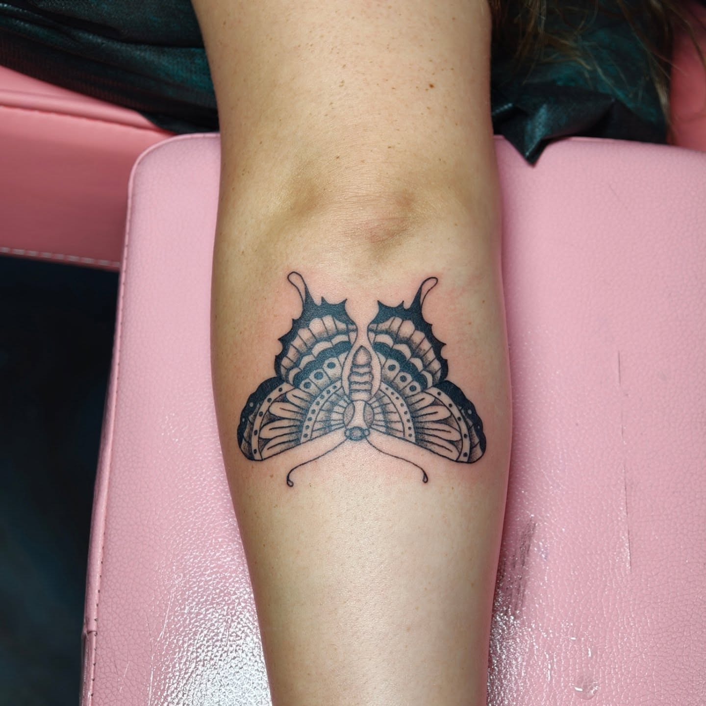 Butterfly black and grey tattoo on the forearm by Dani Sandoval, Anaheim, California
