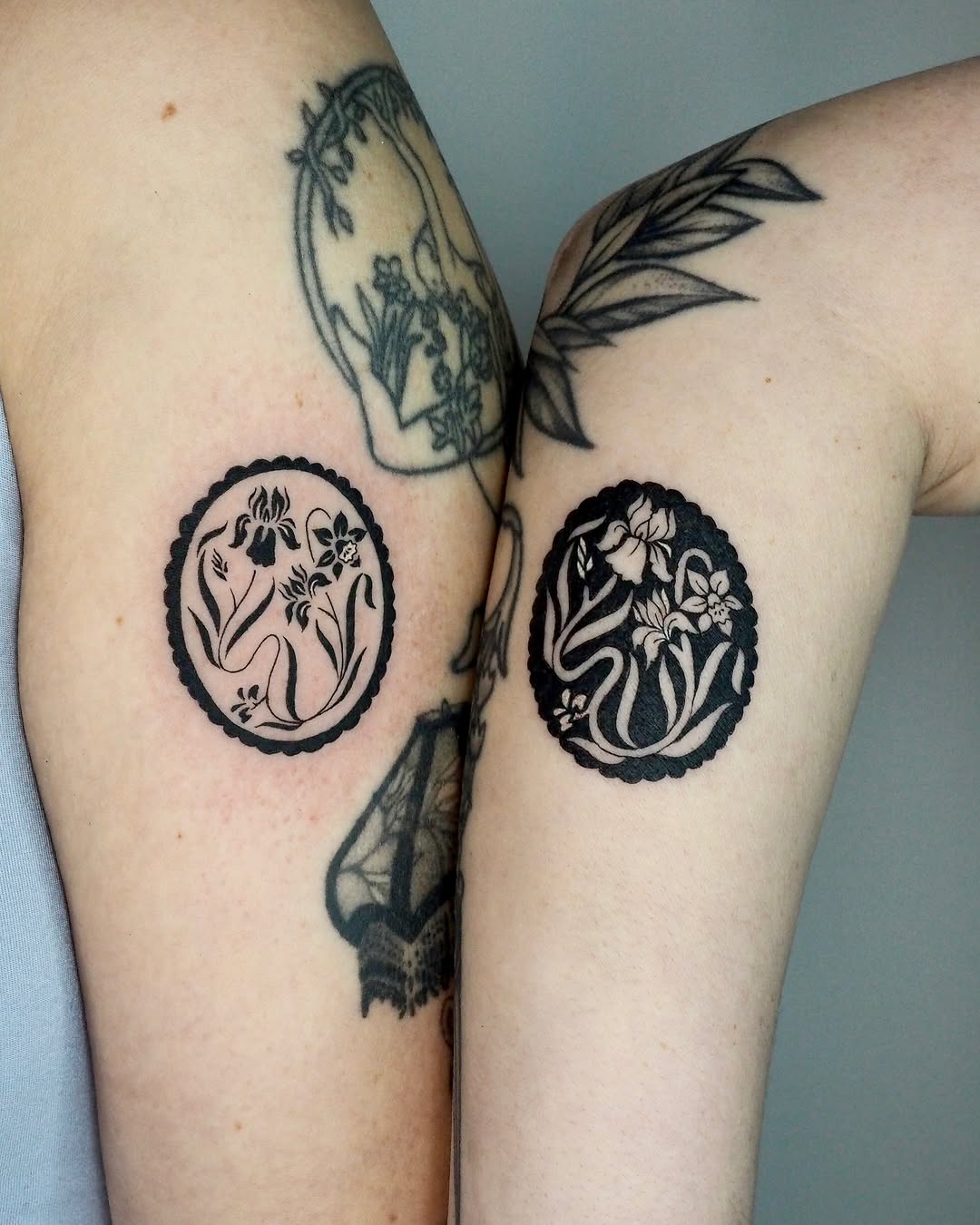 Floral medallions dotwork tattoo on the forearm by A. Eye Tat