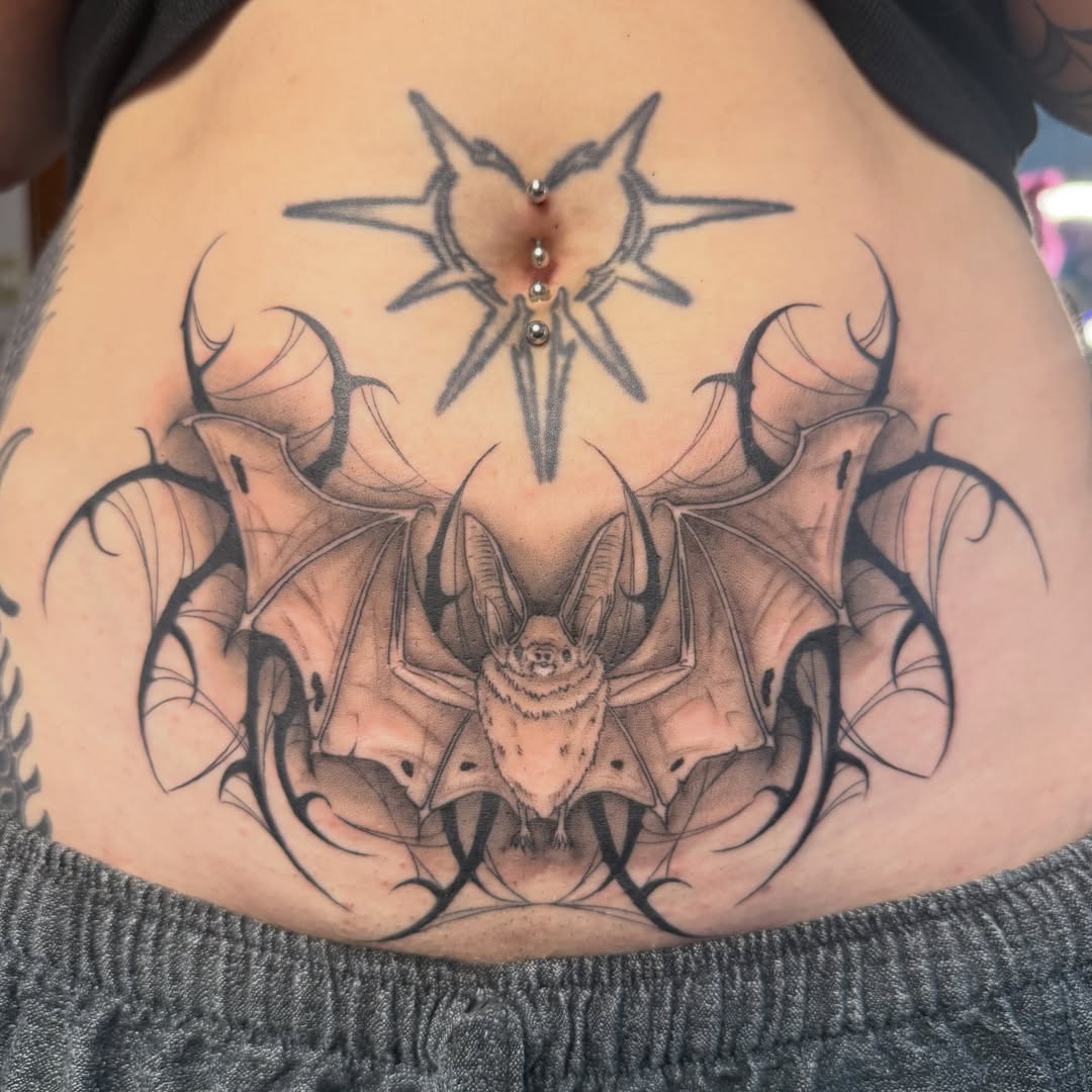 Bat realism tattoo on the torso by Sania Marquez