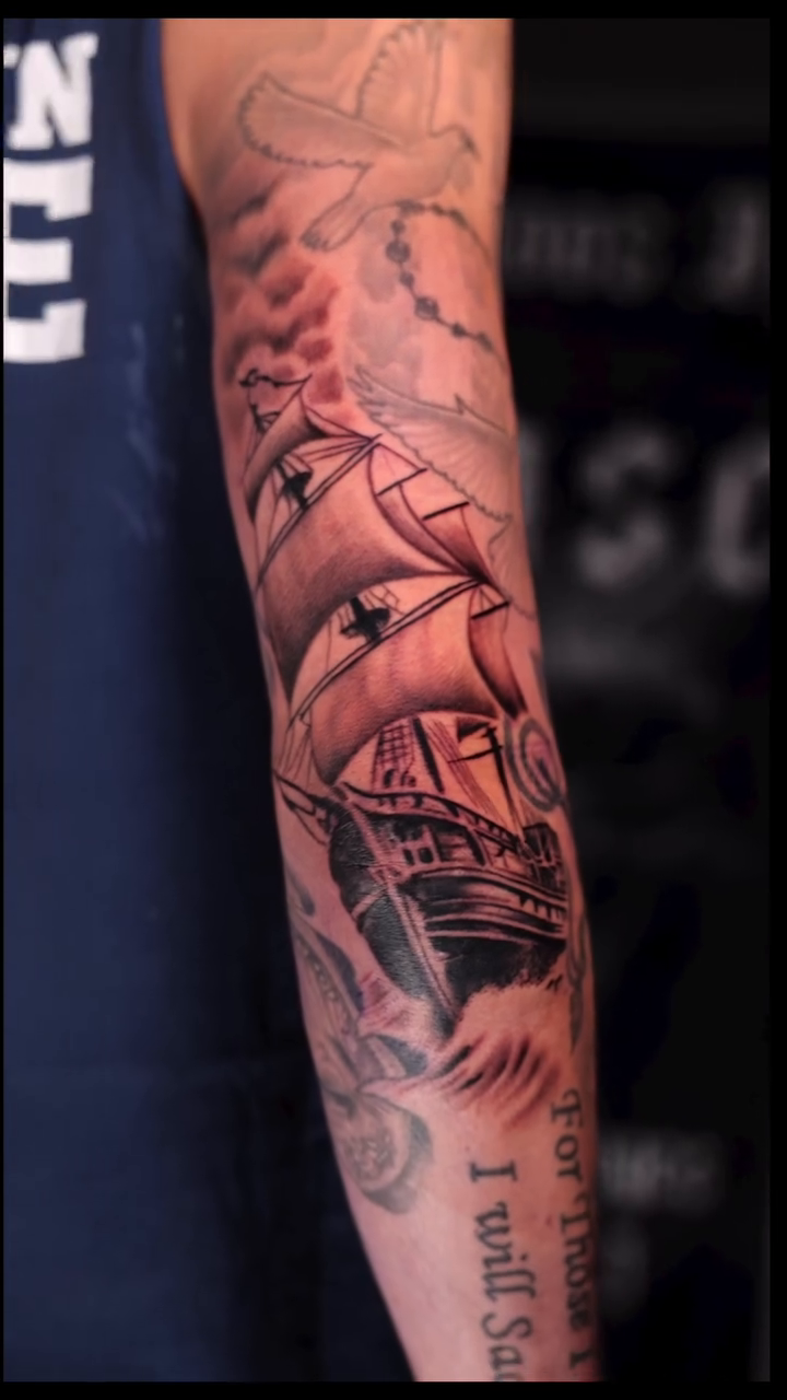 Sailing ship with text Chicano tattoo on the forearm by InkbyEase, Wayne, New Jersey