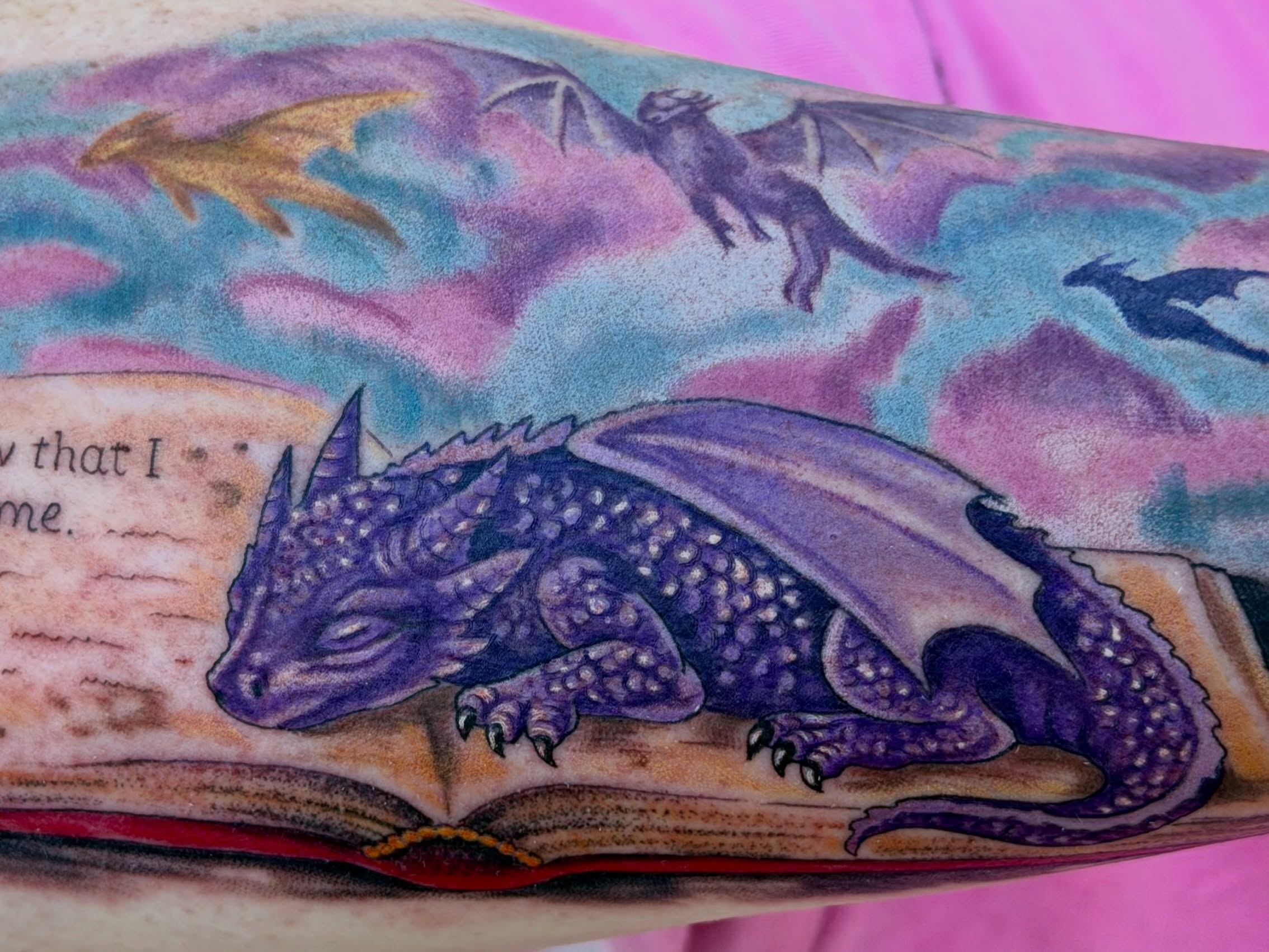 Purple dragon dotwork tattoo on the forearm by Caitlynn Austin