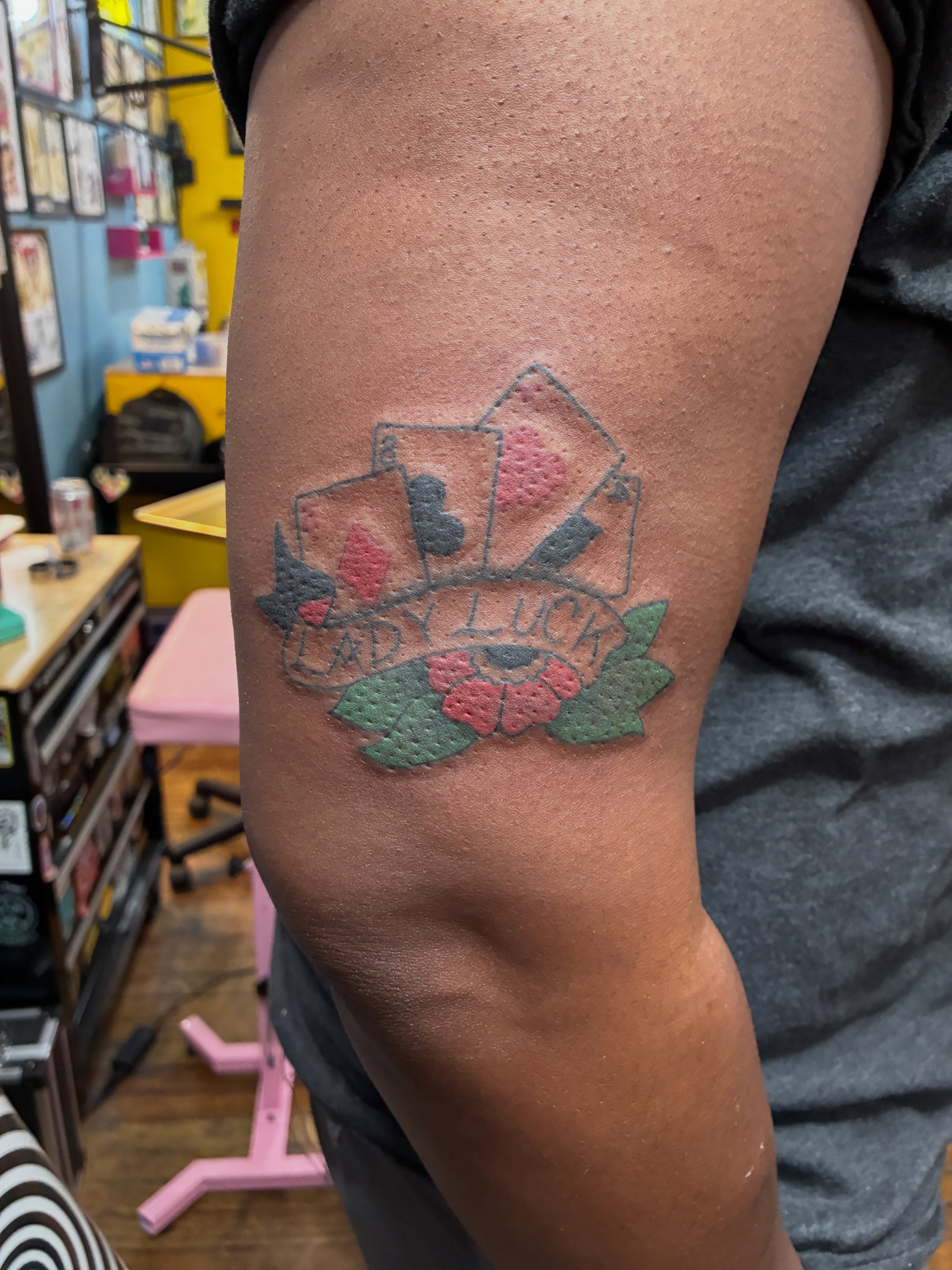 Cards and flowers dotwork tattoo on the forearm by Seattle Tattoo Artist
