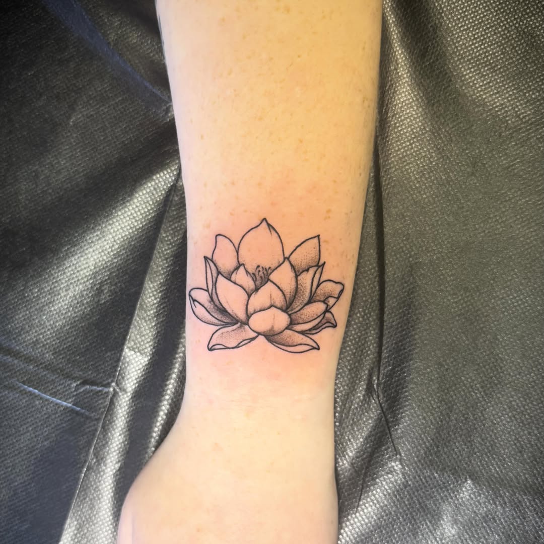 Lotus flower sketch tattoo on the forearm by Taytum Marsing, Salt Lake City, Utah