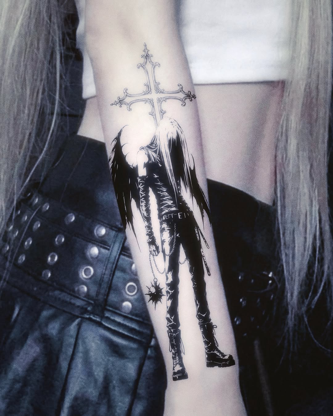 Angelic figure dark realism tattoo on the forearm by LX7