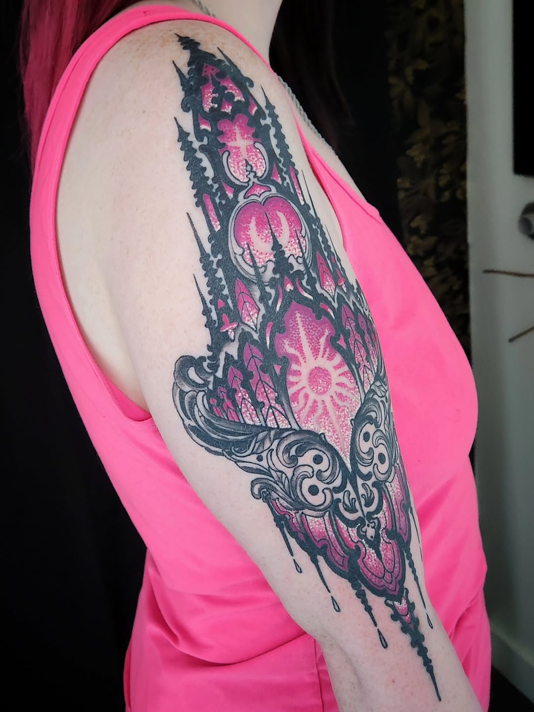 Ornate gothic architecture cyber sigilism tattoo on the upper arm by Randy