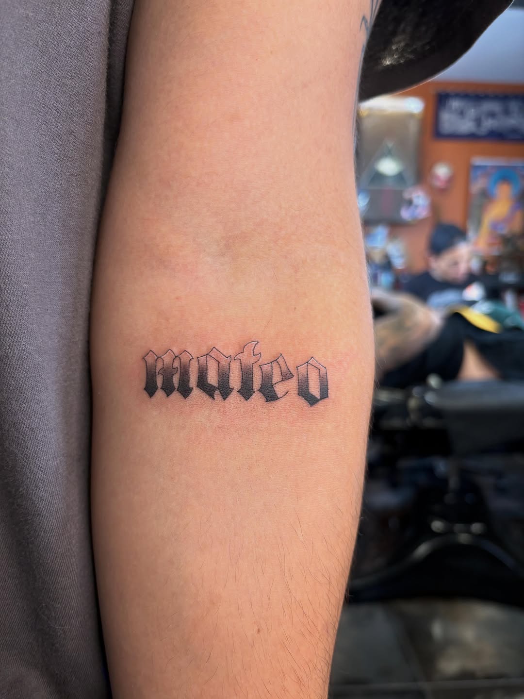 Mateo lettering lettering tattoo on the forearm by alana khounmeuang