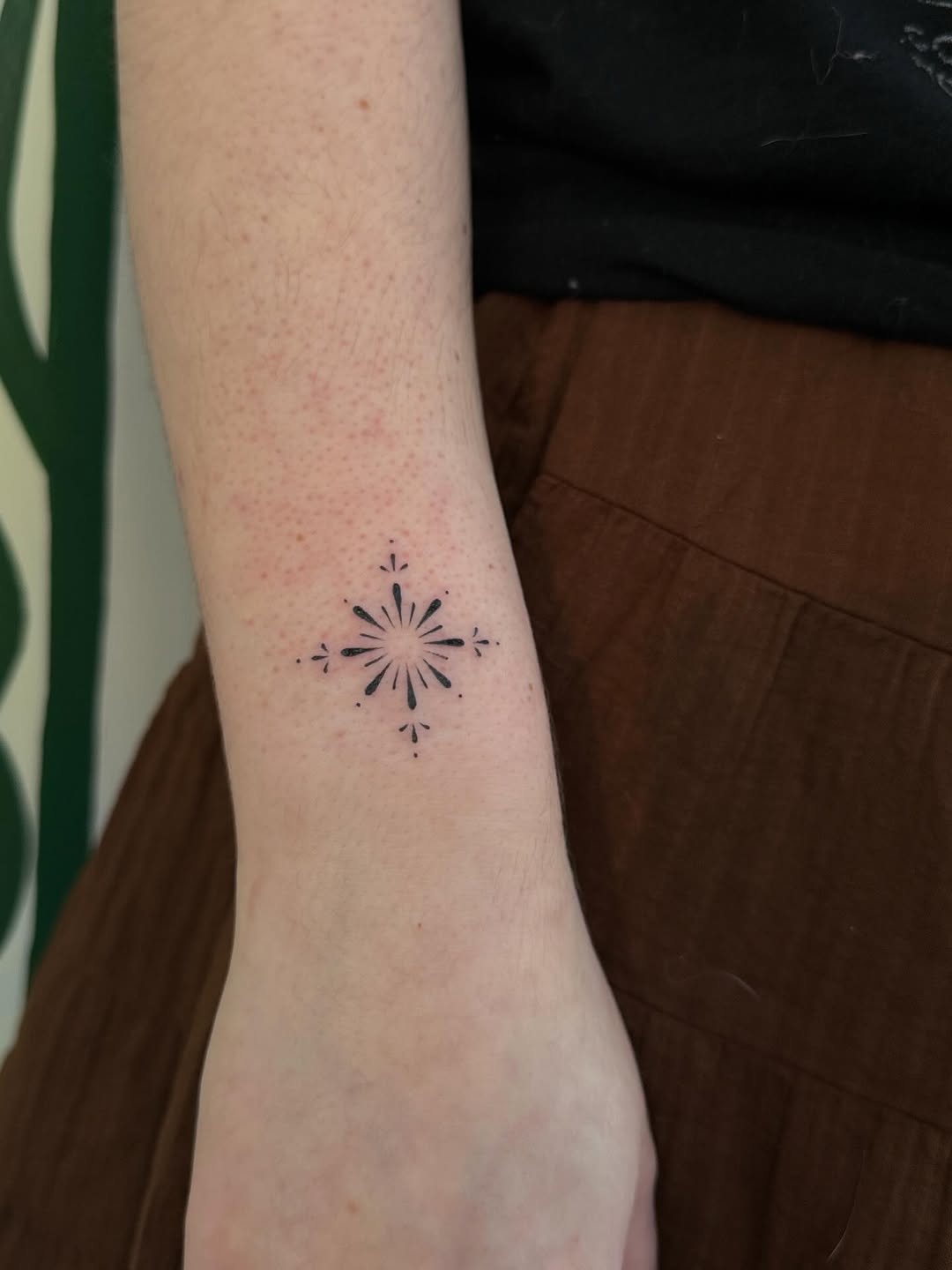 Starburst ornamental tattoo on the forearm by gabrielle rosemary ποΈ
