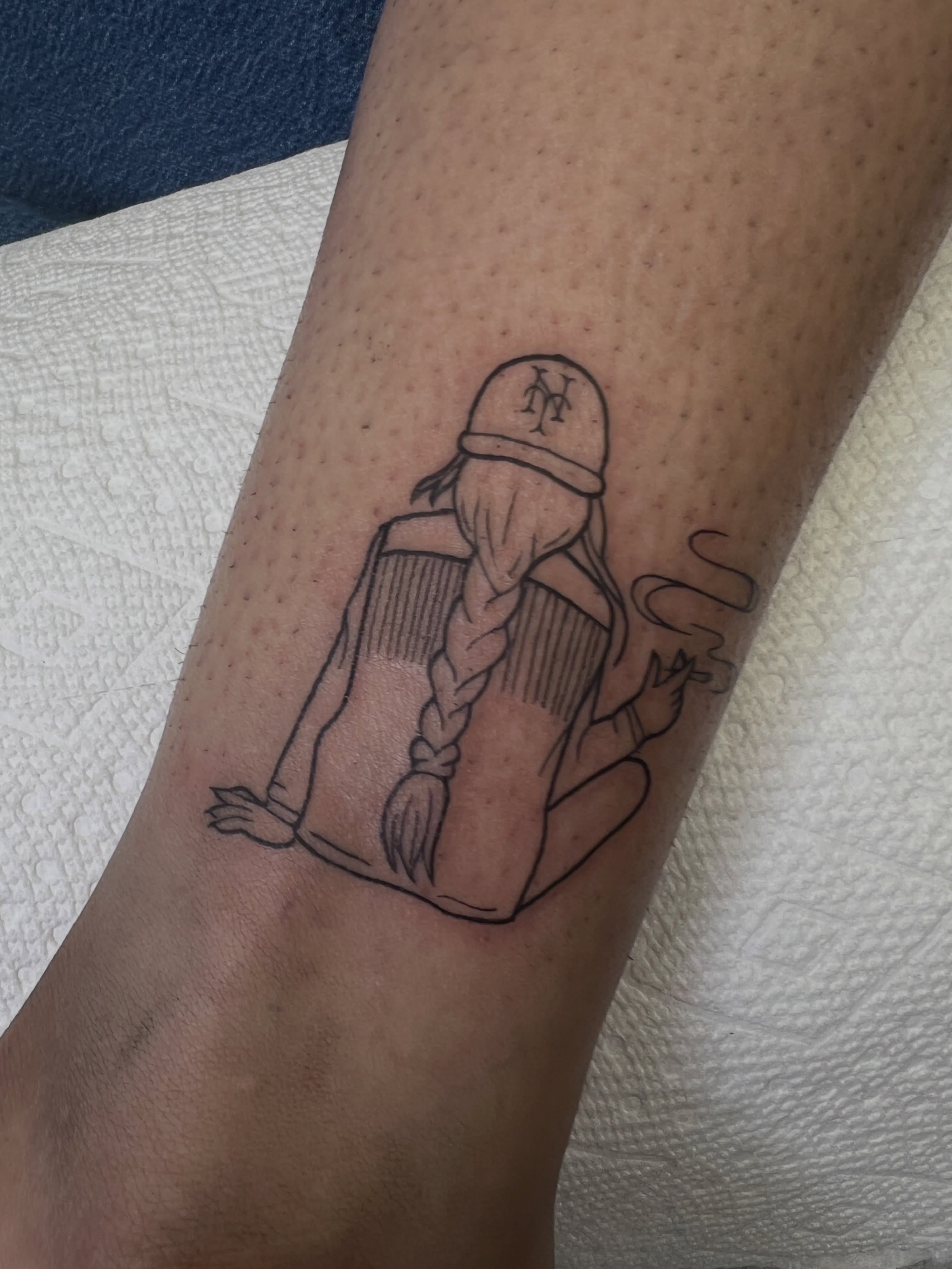 Book and girl black and grey tattoo on the forearm by Blair Schwartz, Asbury Park, New Jersey