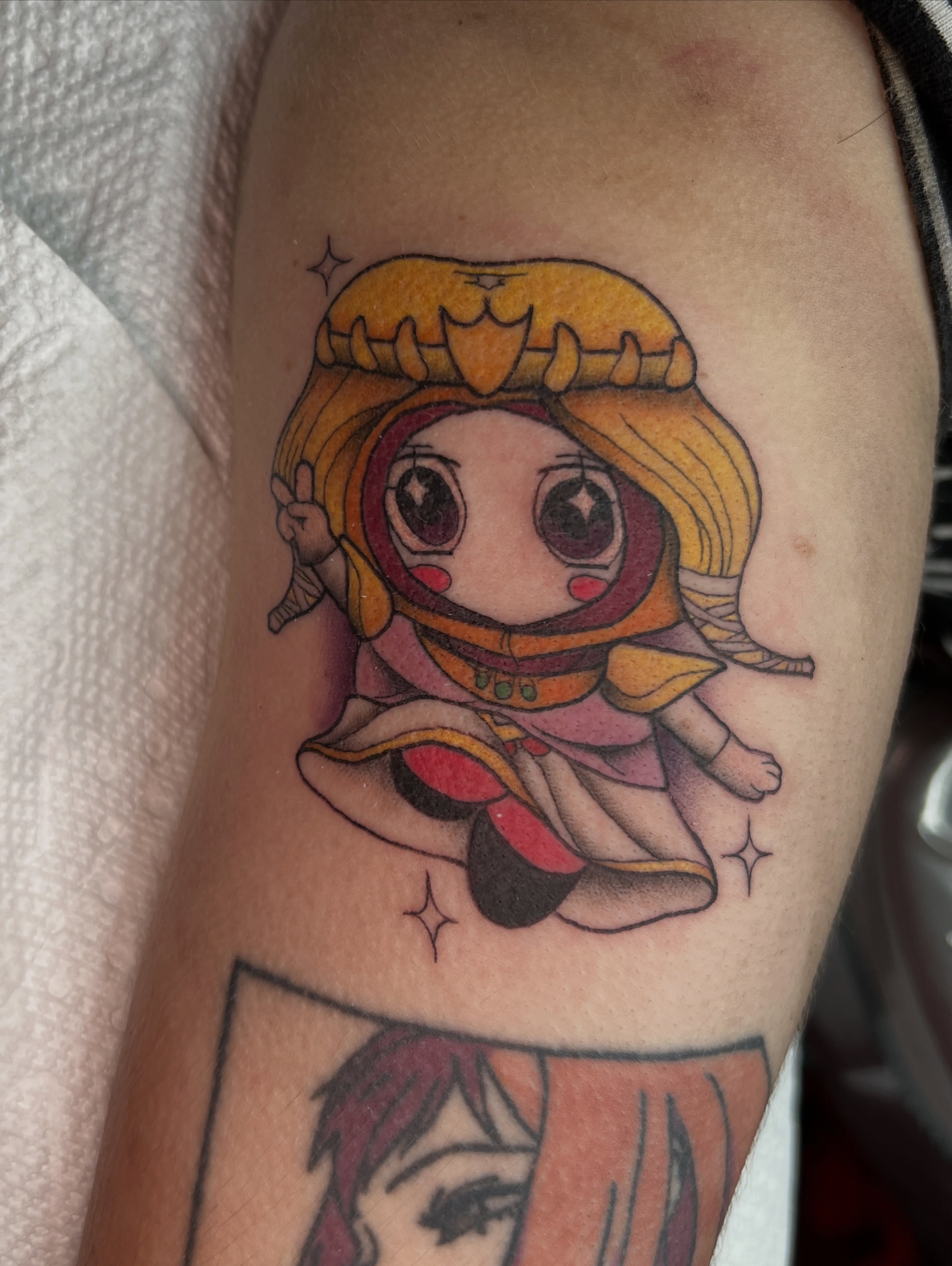 Chibi character anime tattoo on the forearm by Blair Schwartz, Asbury Park, New Jersey