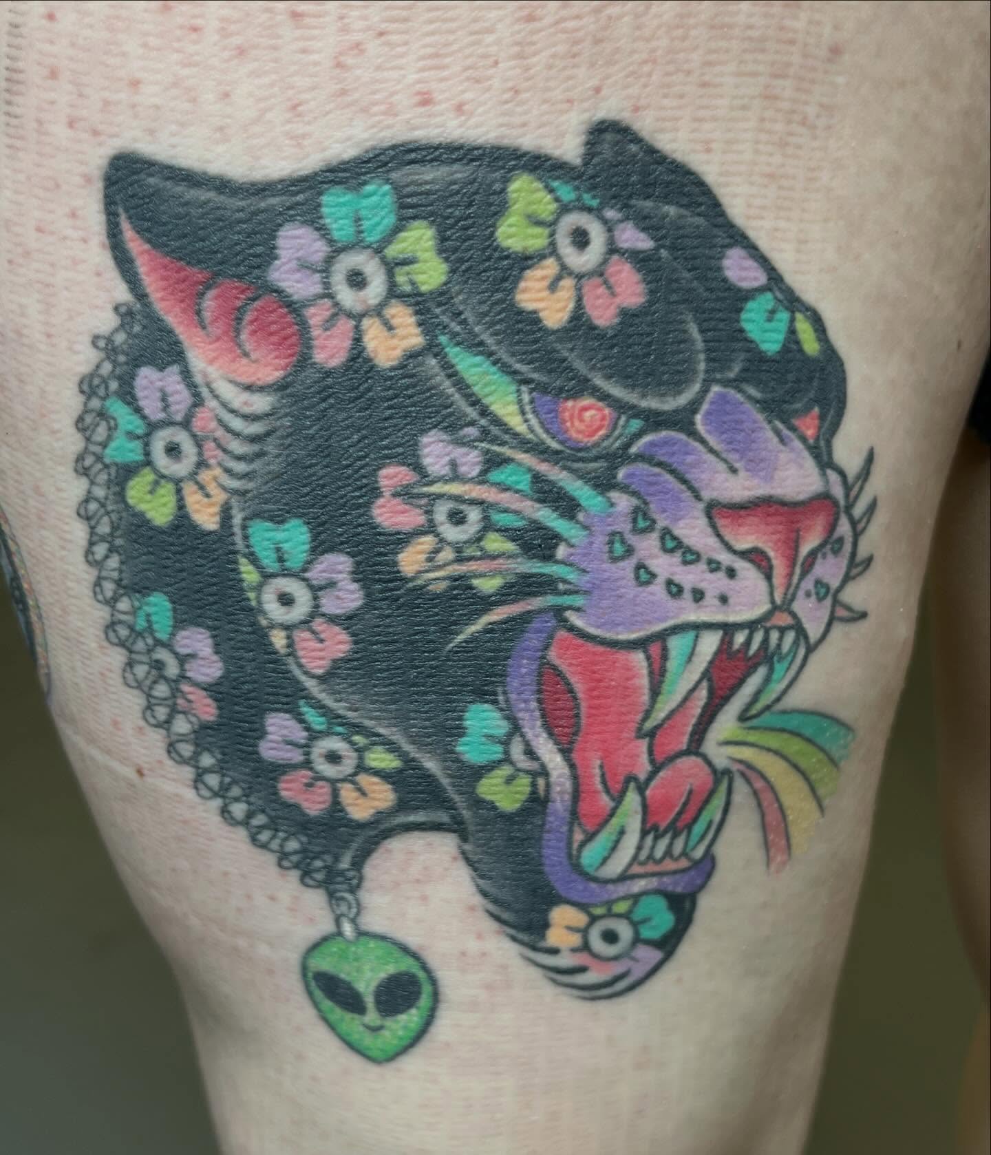 Panther Chicano tattoo on the thigh by Ash Wheeler
