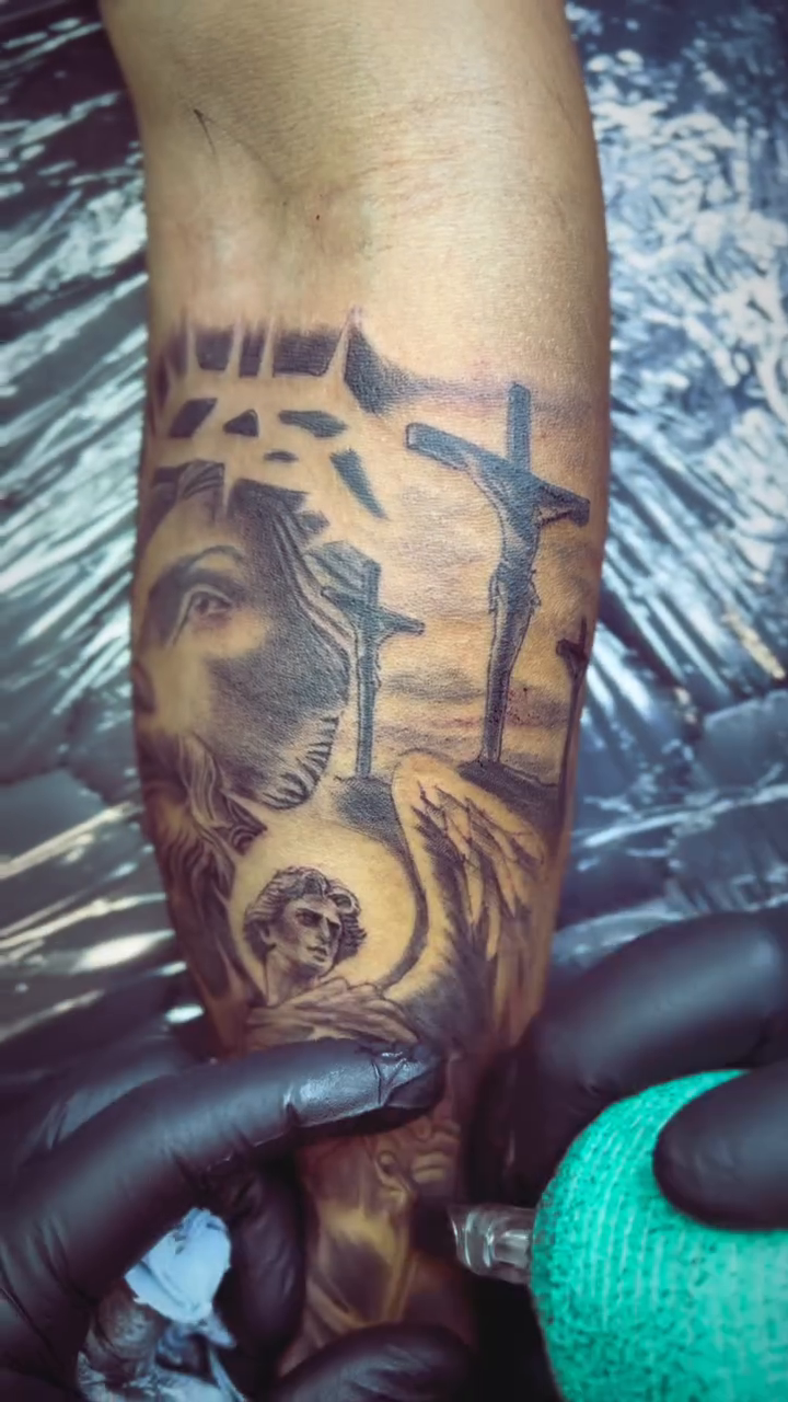 Jesus Christ and religious imagery realism tattoo by Monstro Ink Arts Tattoos, Bakersfield, California