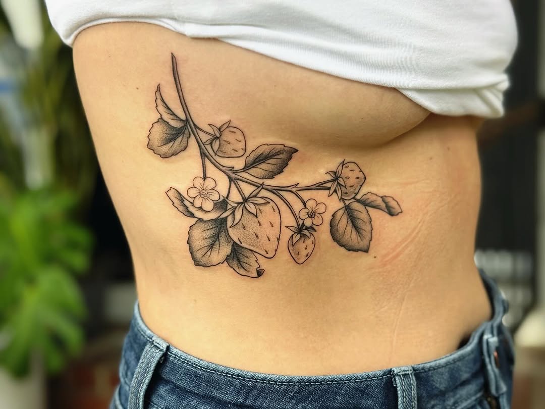 Strawberry branch fine line tattoo on the ribs by π½πππππ π½πππππππ, New Orleans, Louisiana