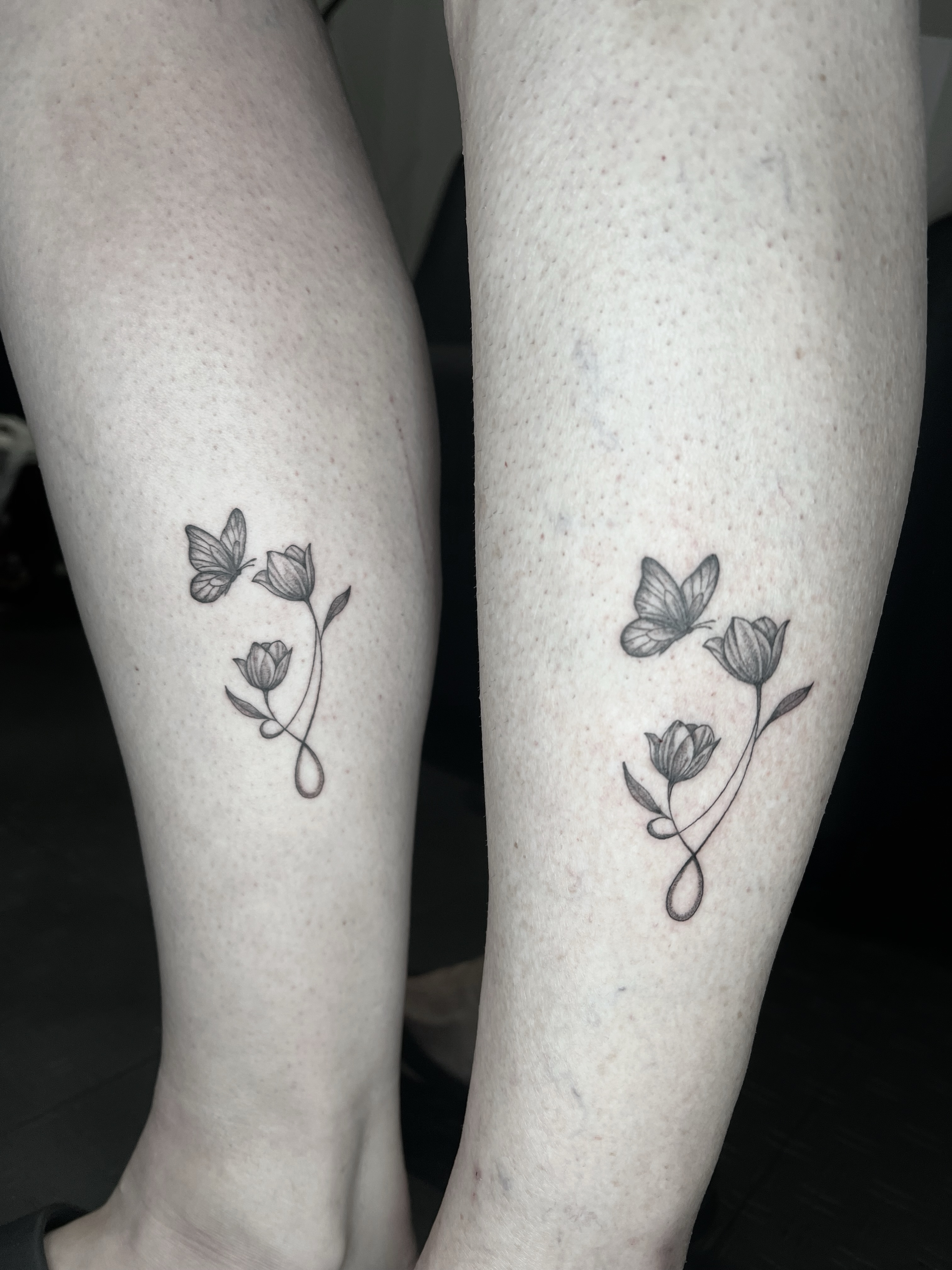 Flowers and butterflies black and grey tattoo on the leg by ๐ฆ๐๐๐ก ๐ฆ๐๐๐