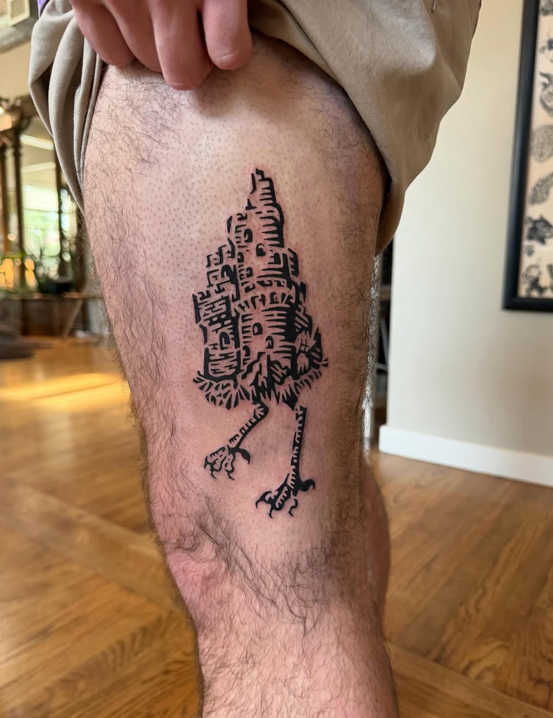 Castle on bird legs fine line tattoo on the thigh by M
