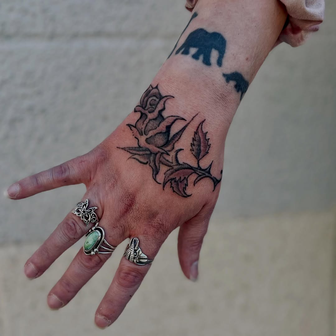 Rose branch neo-traditional tattoo on the hand by Christien Xavier Alba, Salt Lake City, Utah