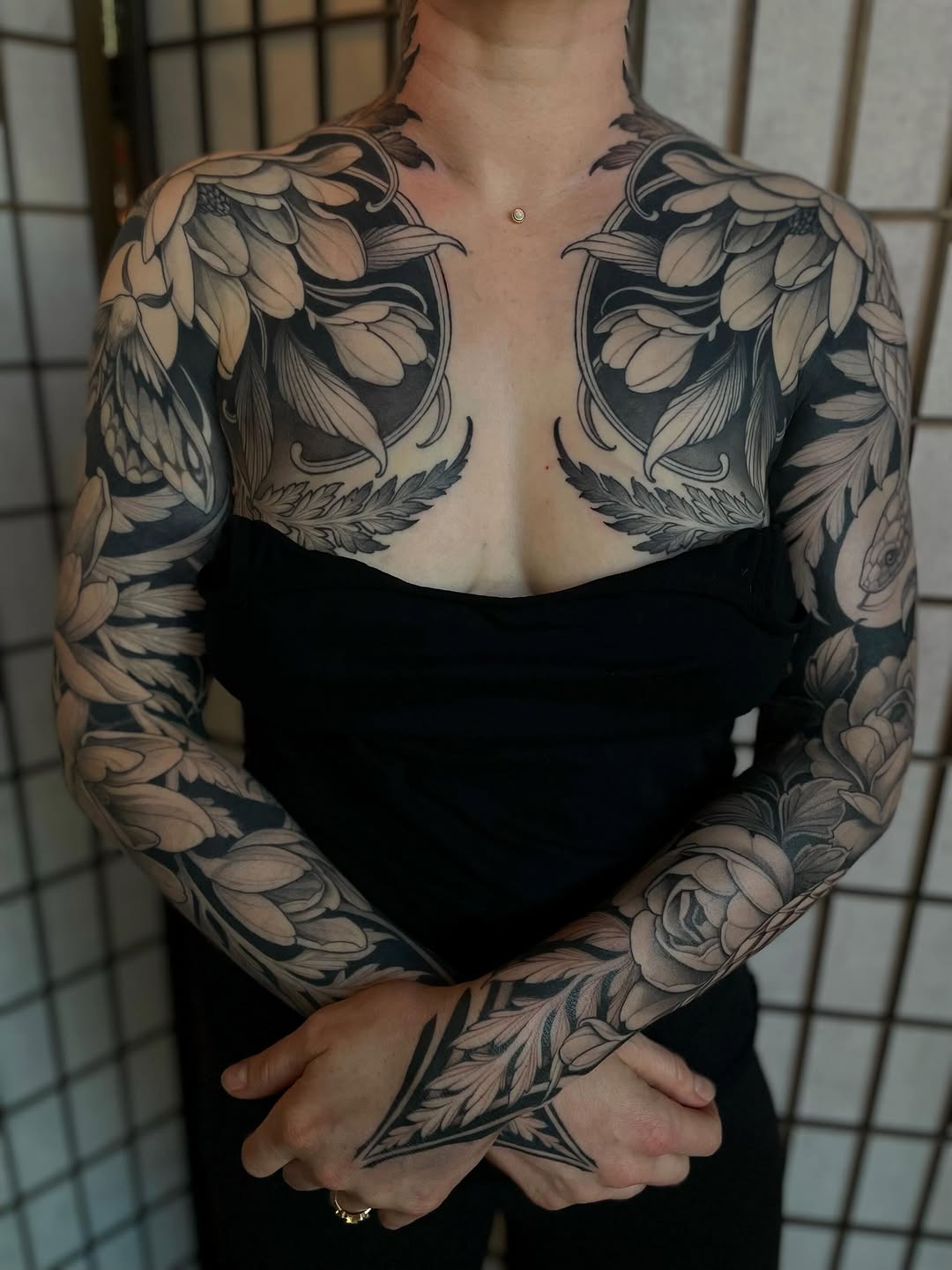 Floral chest and sleeve tattoo Japanese tattoo on the chest by Madelyn Roberts, Bellingham, Washington