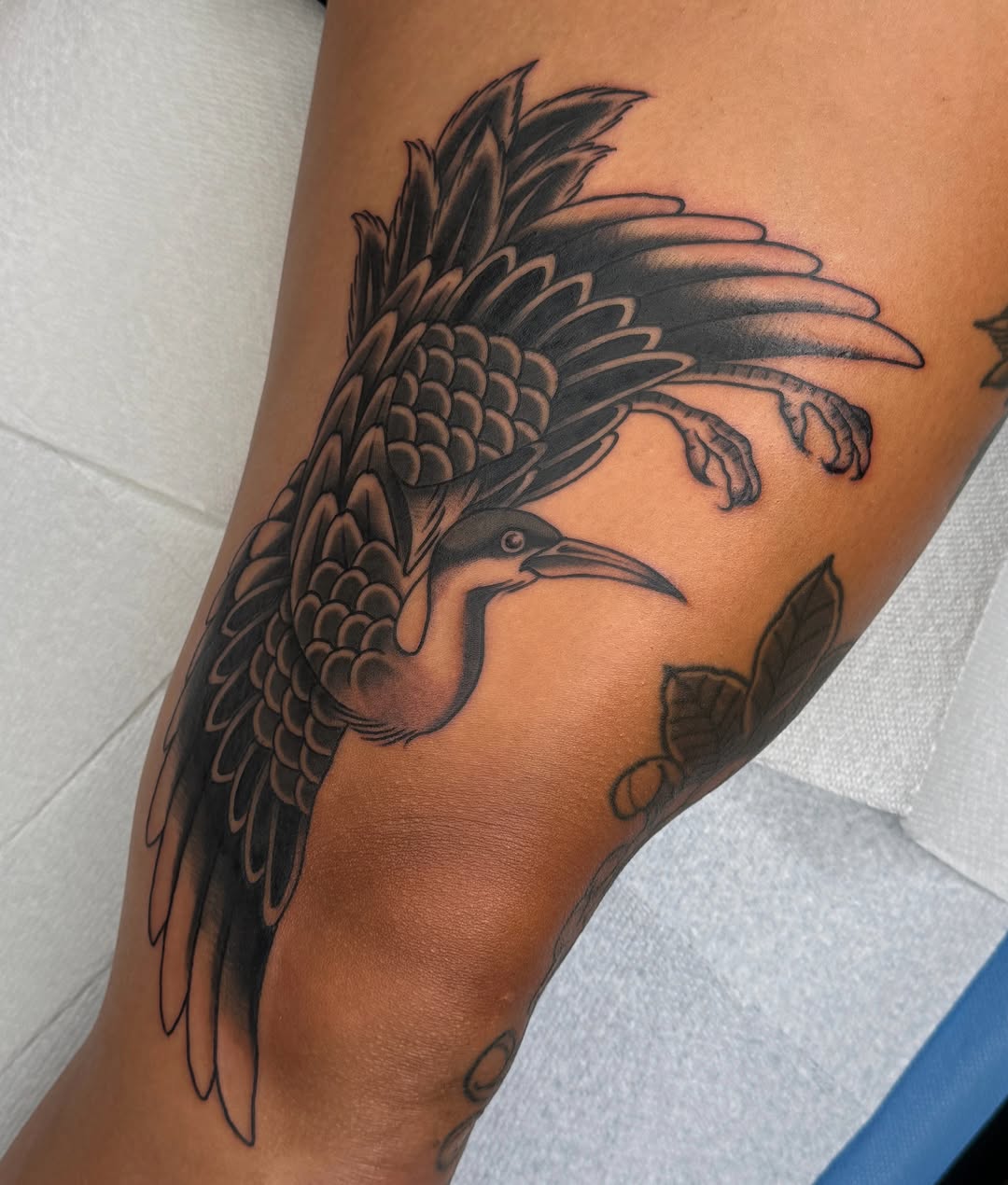 Bird black and grey tattoo on the thigh by Bre Grover, Vancouver, British Columbia