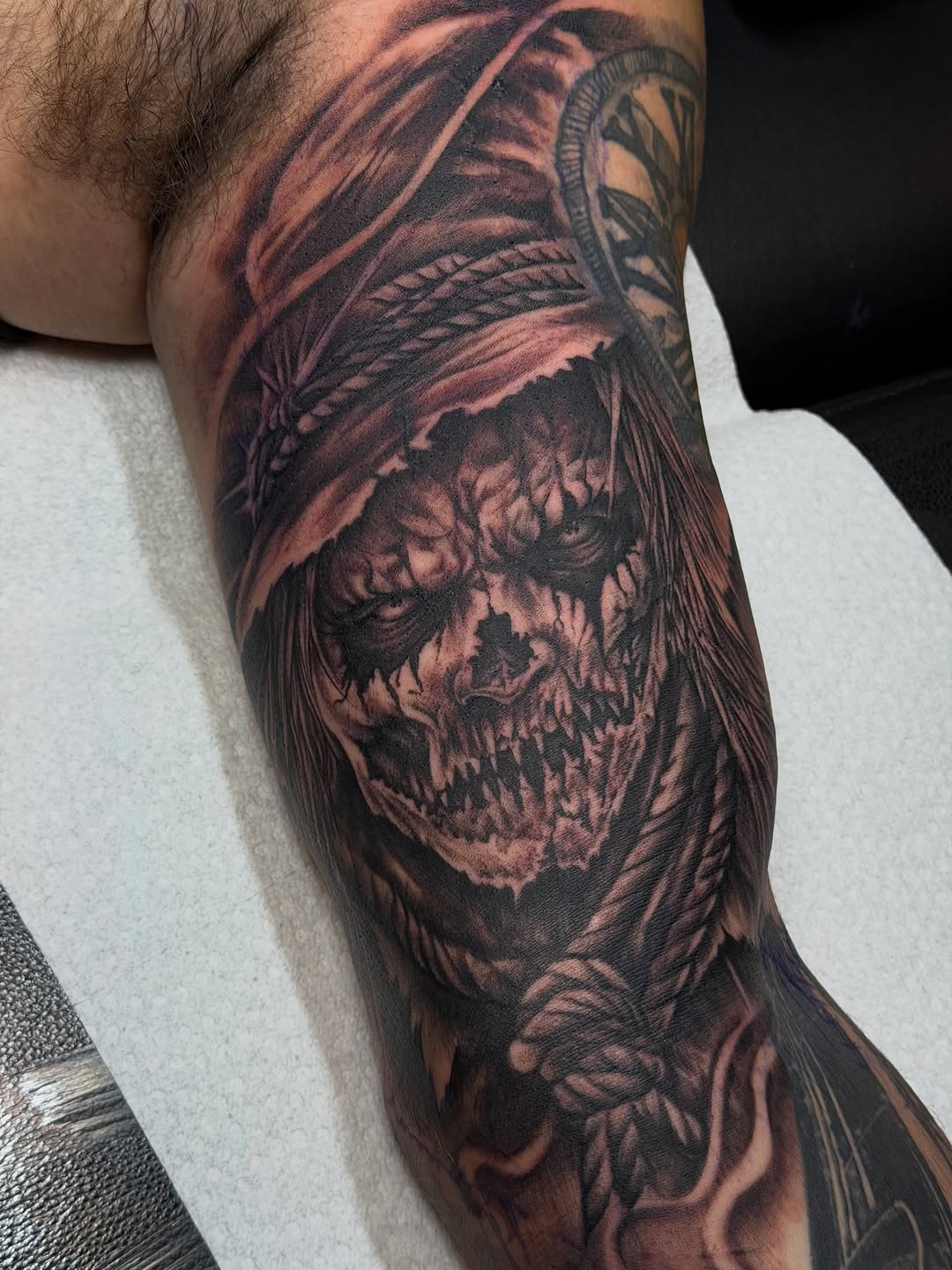 Tattoo by @calvinmaryland_tattoos — dark_realism, black_and_grey