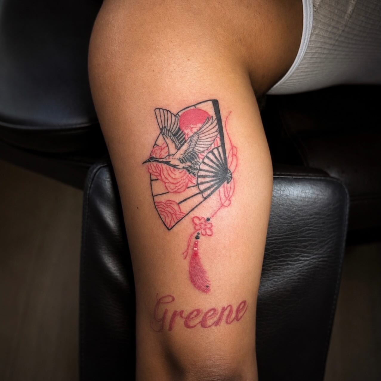 Bird and fan japanese irezumi tattoo on the forearm by Kelsoink