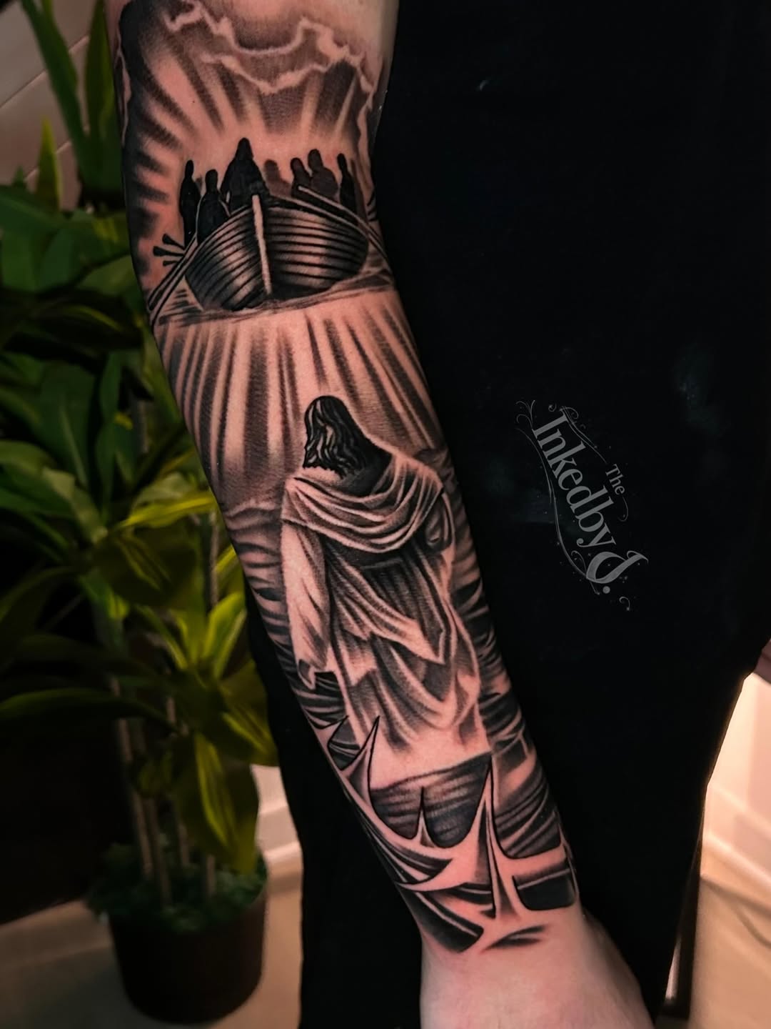 Jesus walking on water realism tattoo on the forearm by Jaylen - Atlanta Tattoo Artist