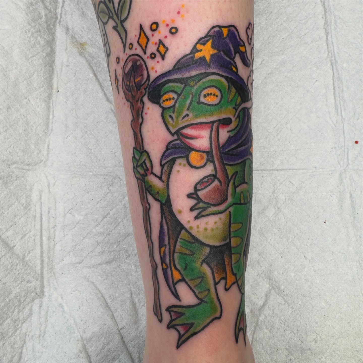 Frog wizard American traditional tattoo on the forearm by Joel Smith, Manhattan, Kansas