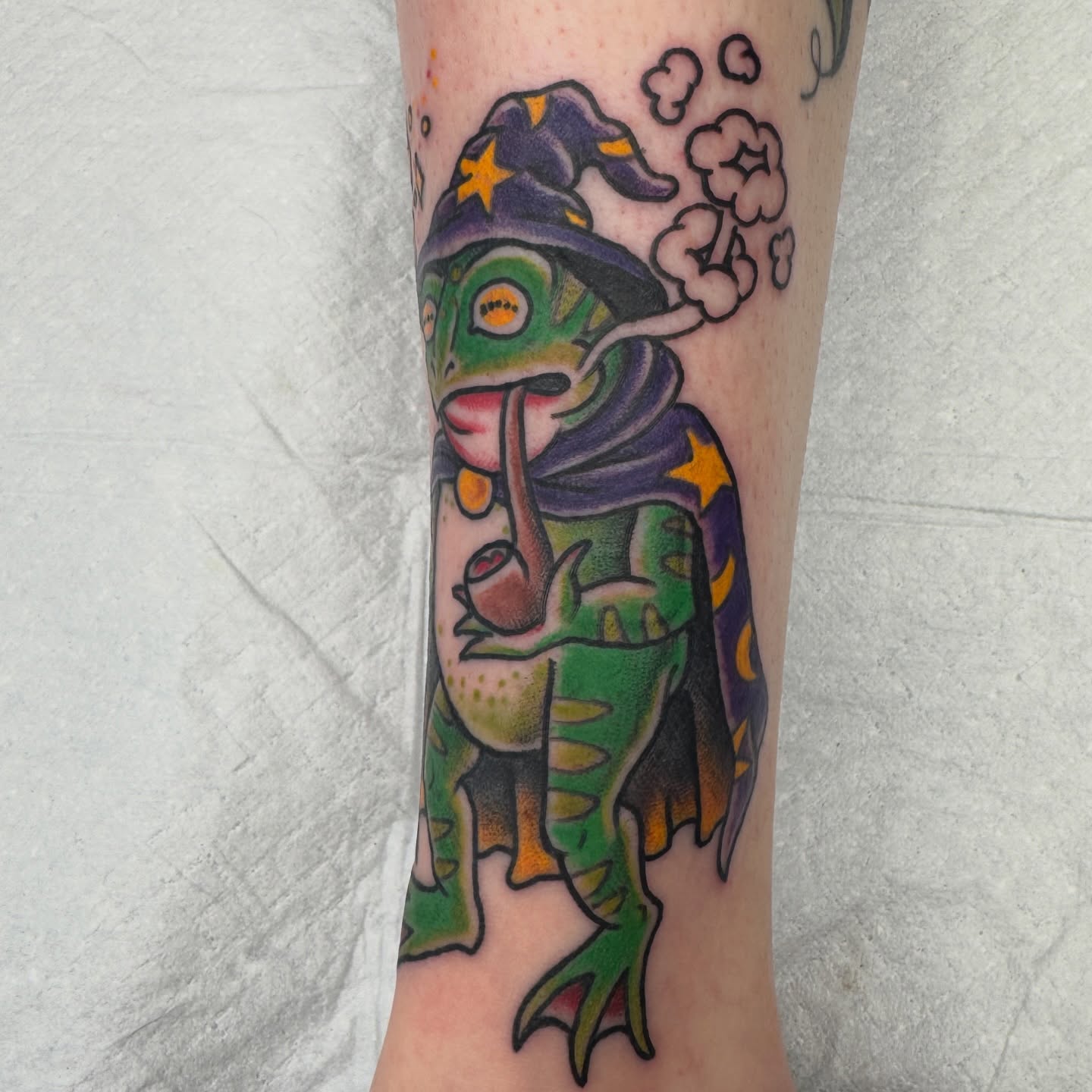 Wizard frog American traditional tattoo on the forearm by Joel Smith, Manhattan, Kansas