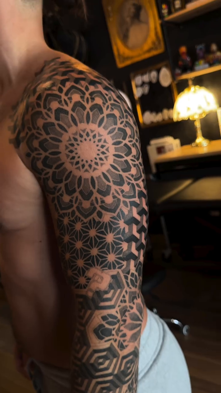 Tattoo by @chrisirvintattoos — geometric, dotwork