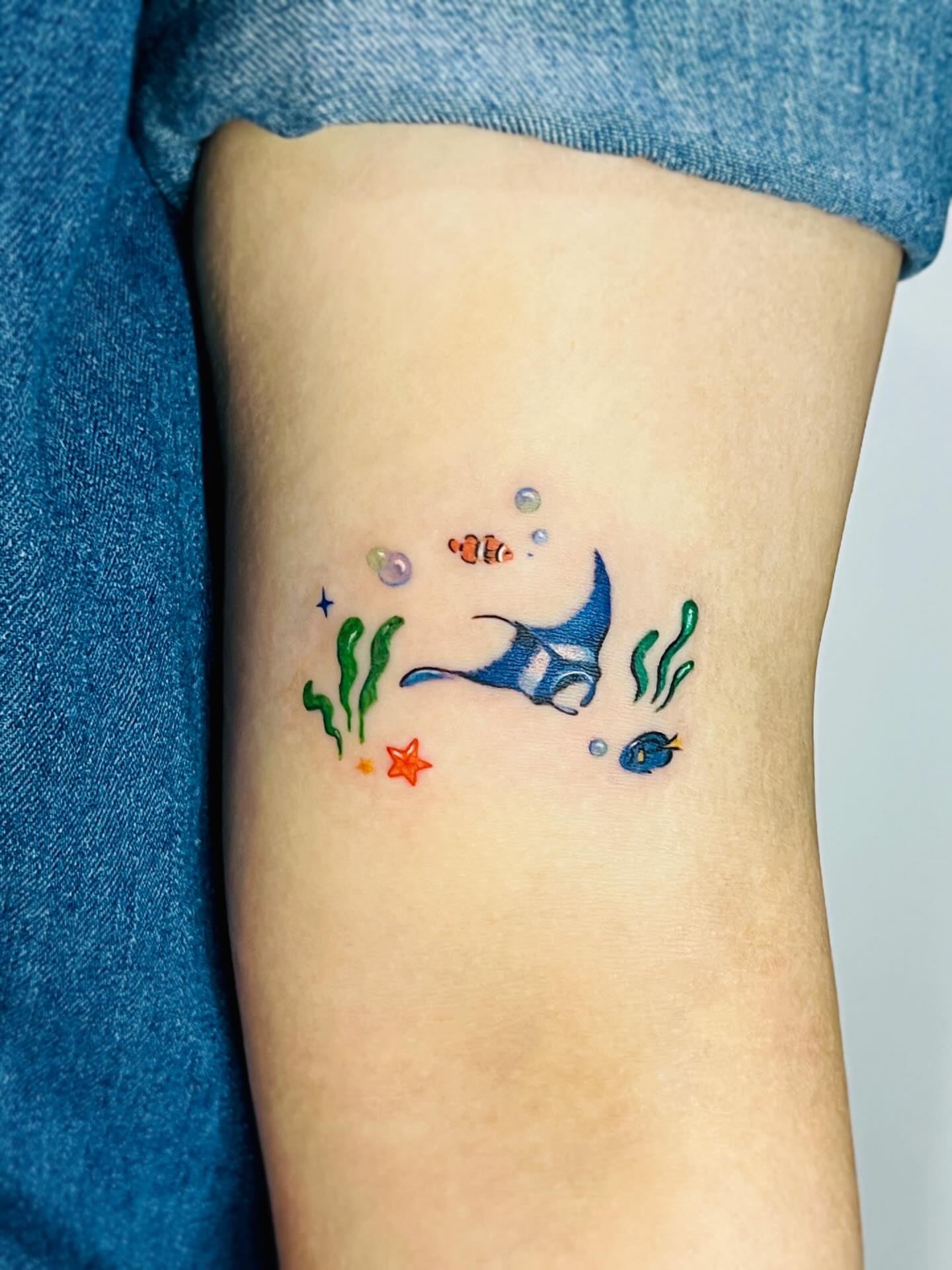 Underwater scene dotwork tattoo on the forearm by Purinn