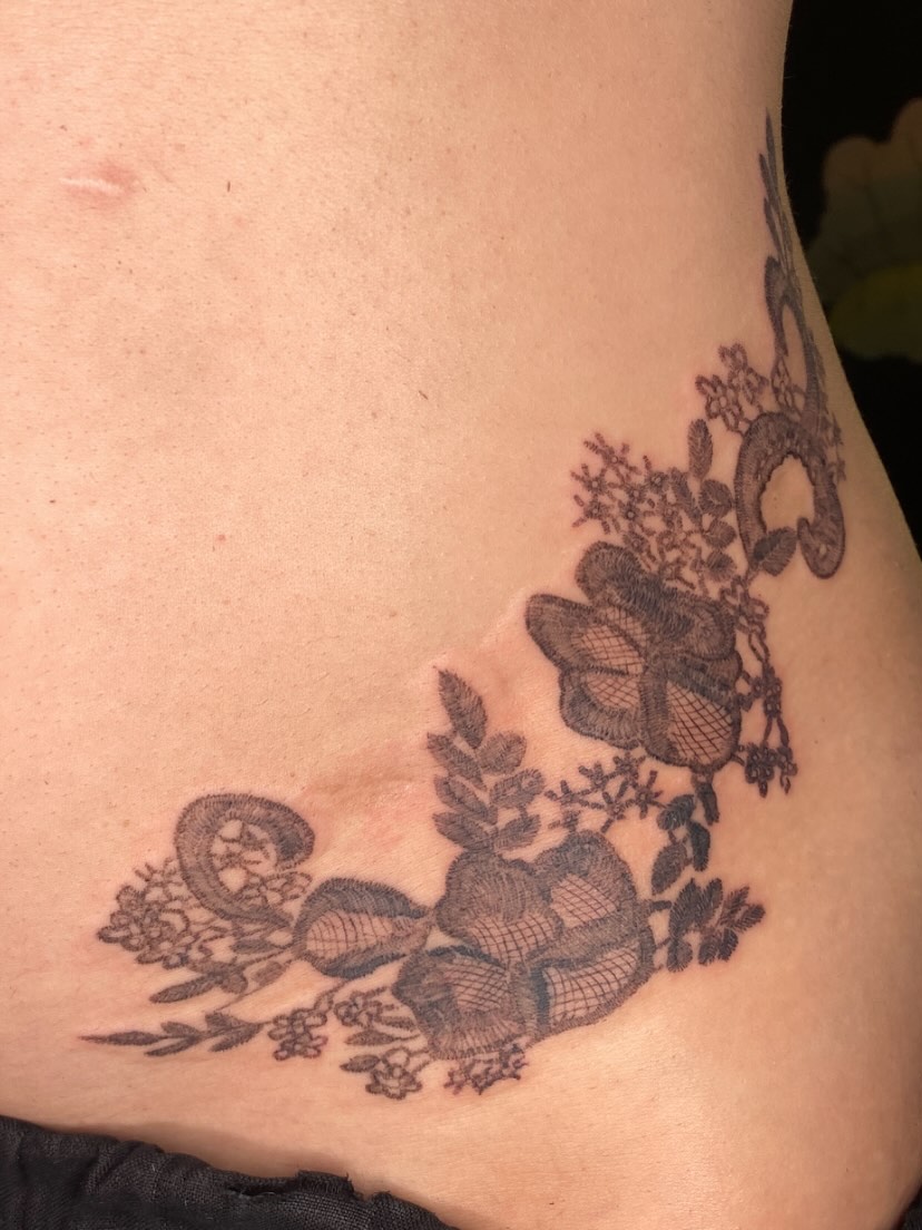 Lace floral design dotwork tattoo on the ribs by °₊⊹ delia ✩ jane ೃ࿔*